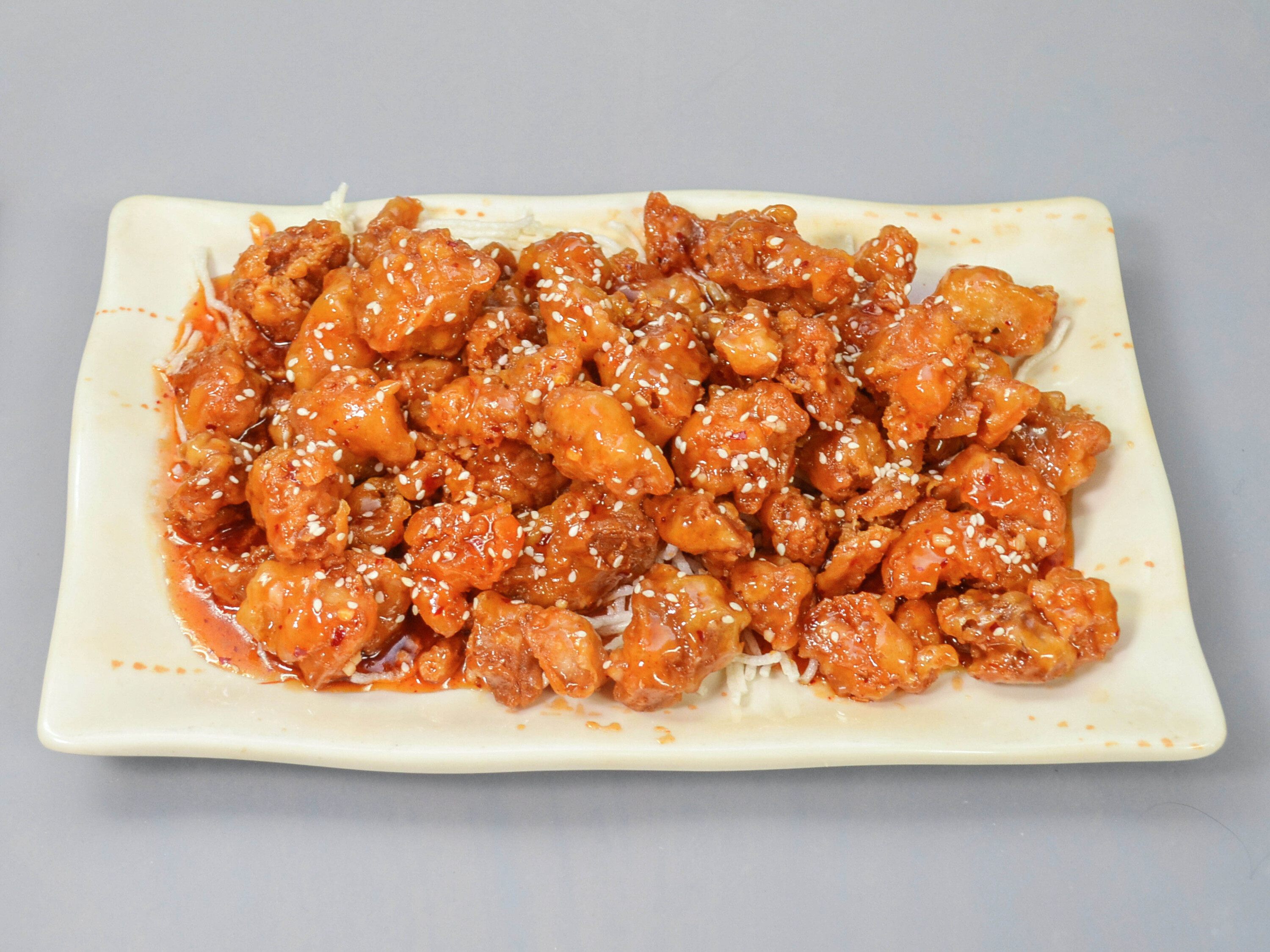 Order Sesame Chicken food online from East Dragon Chinese Restaurant store, Colorado Springs on bringmethat.com