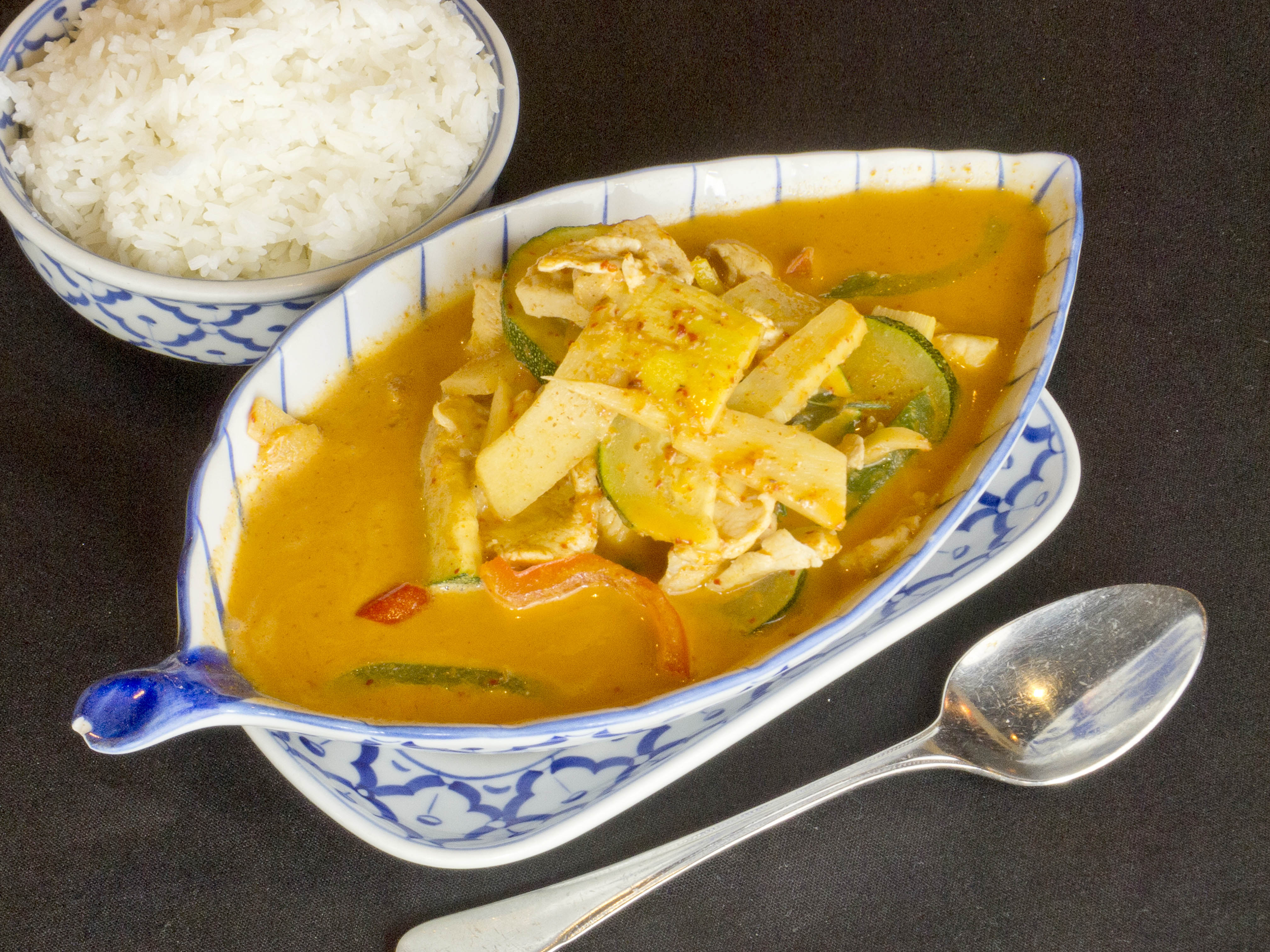 Order Red Curry* food online from Thai Orchid store, ADDISON on bringmethat.com