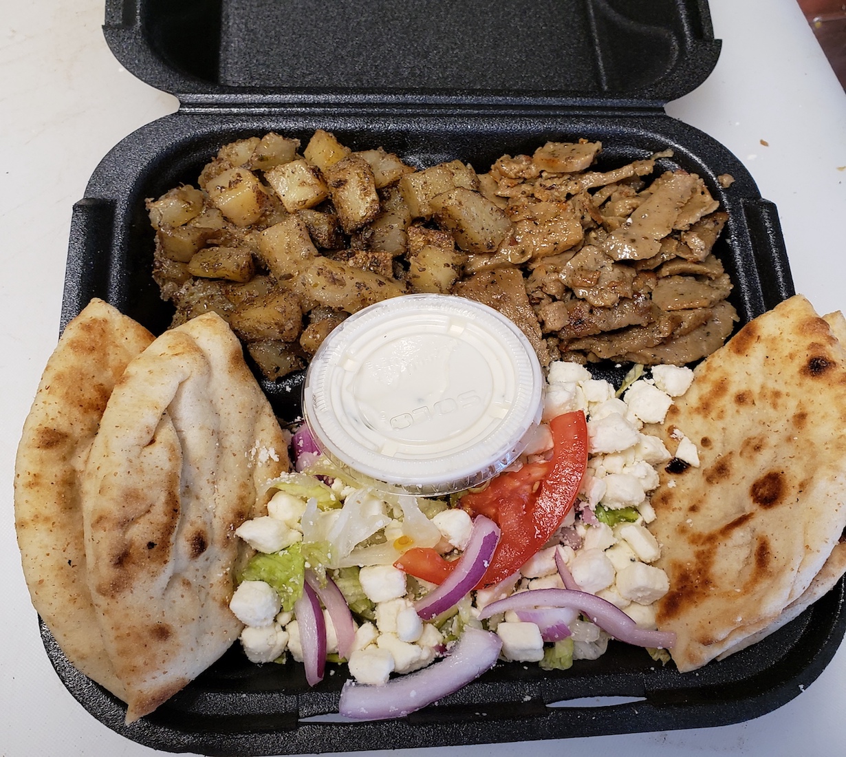 Order Gyro Platter food online from The Mad Greek store, Tyrone on bringmethat.com