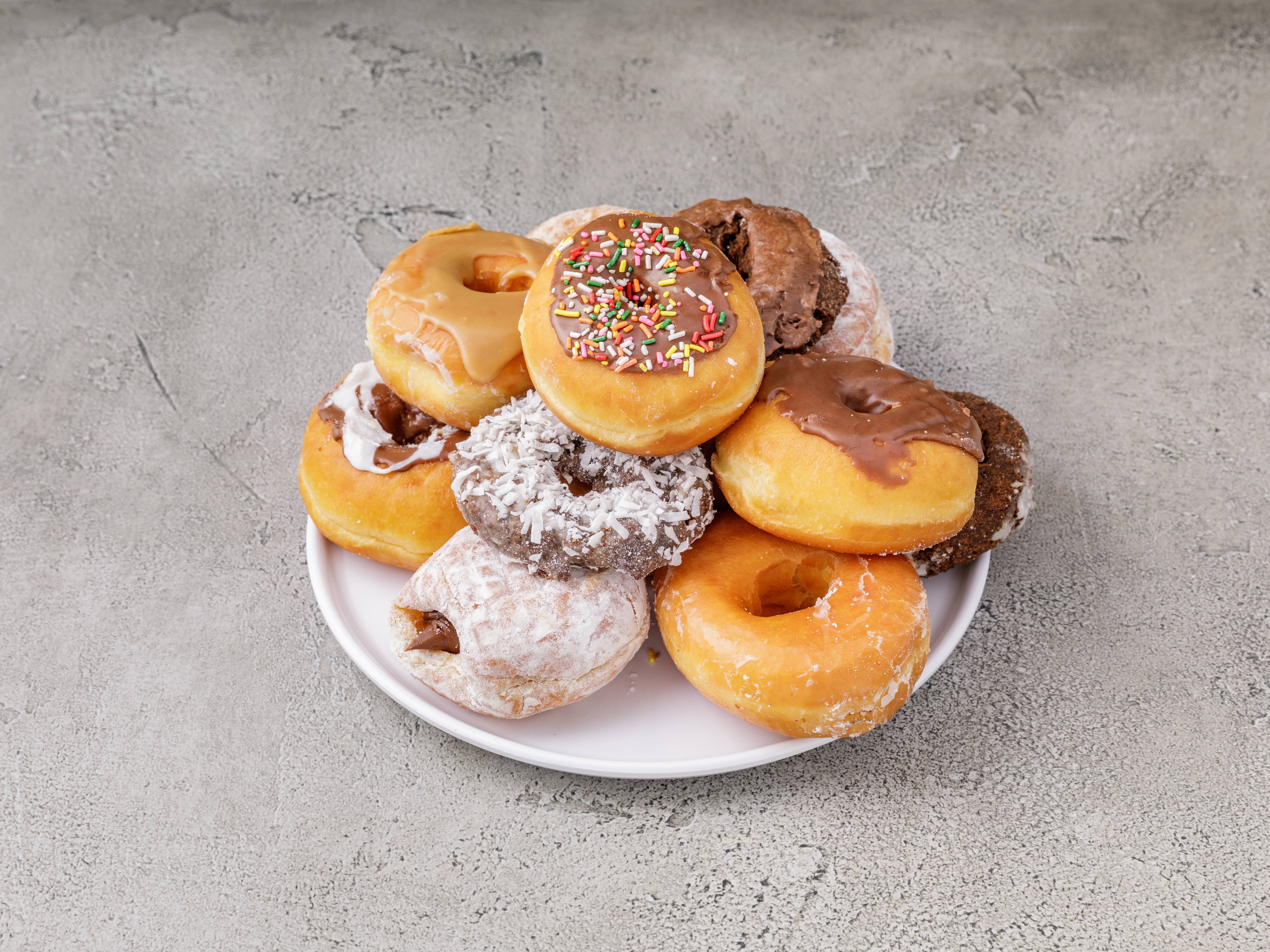Order Dozen Donuts food online from Happy Donuts store, Atlanta on bringmethat.com