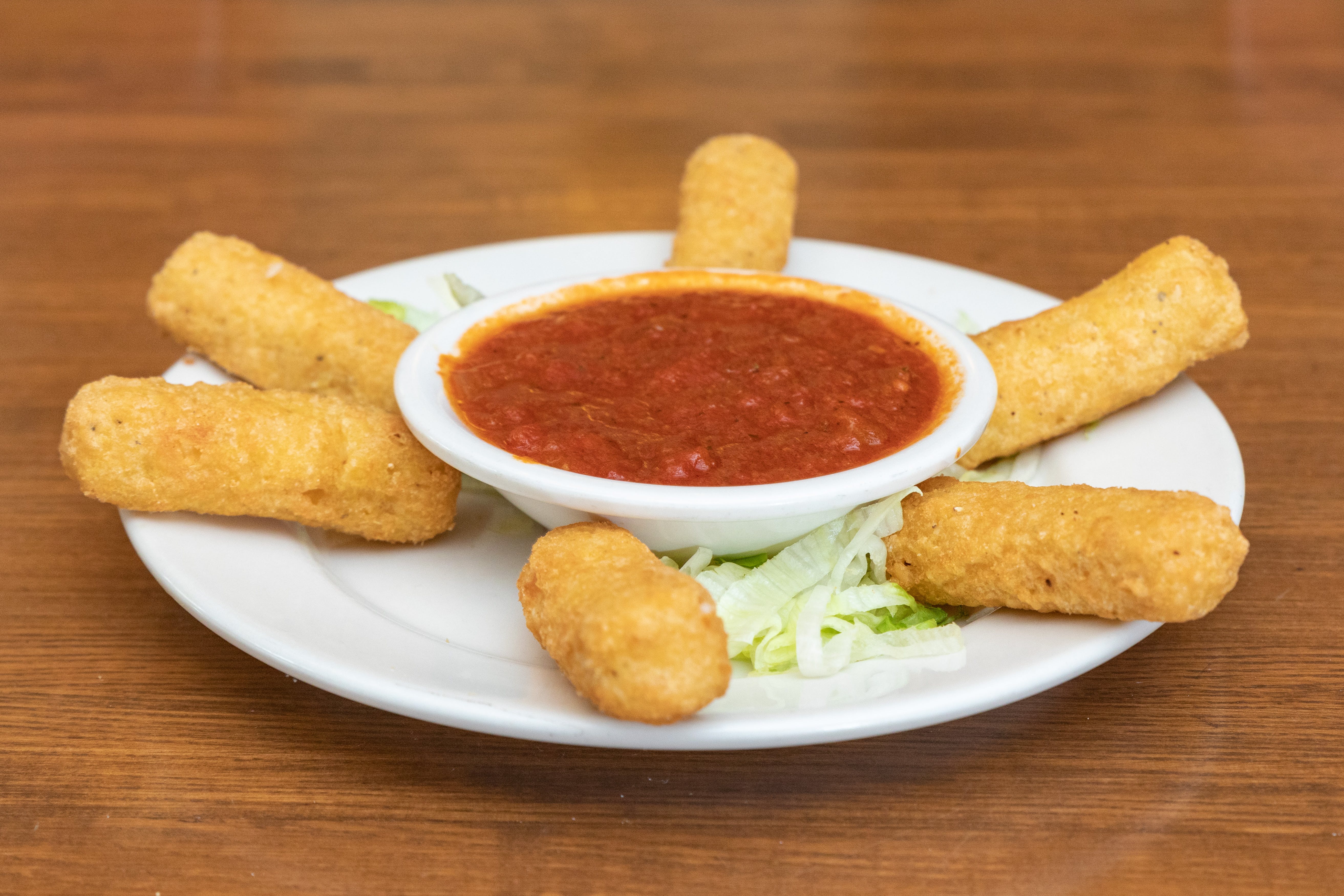 Order Fried Mozzarella Sticks - Appetizer food online from Pizza Palace store, Fairfield on bringmethat.com