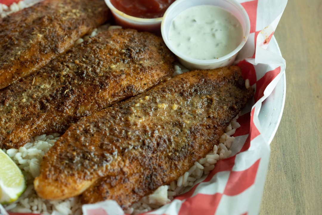 Order 3 Blackened Fish* food online from 7 Spice Cajun Seafood store, Houston on bringmethat.com