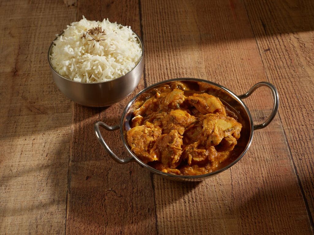 Order Chicken Curry food online from Little India Restaurant & Bar store, Denver on bringmethat.com