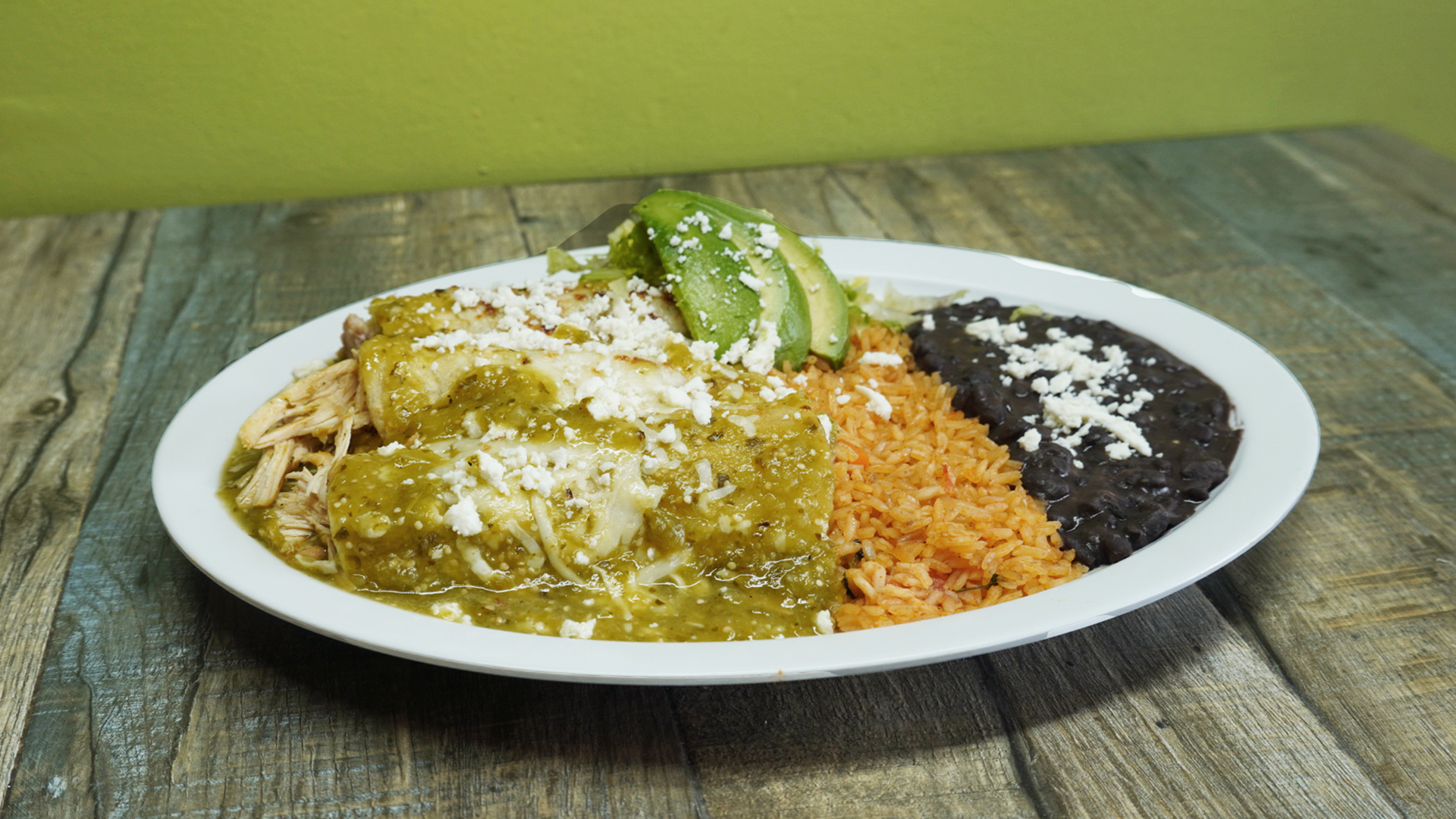 Order Green Chicken Enchilada food online from Benny Munchies store, Culver City on bringmethat.com