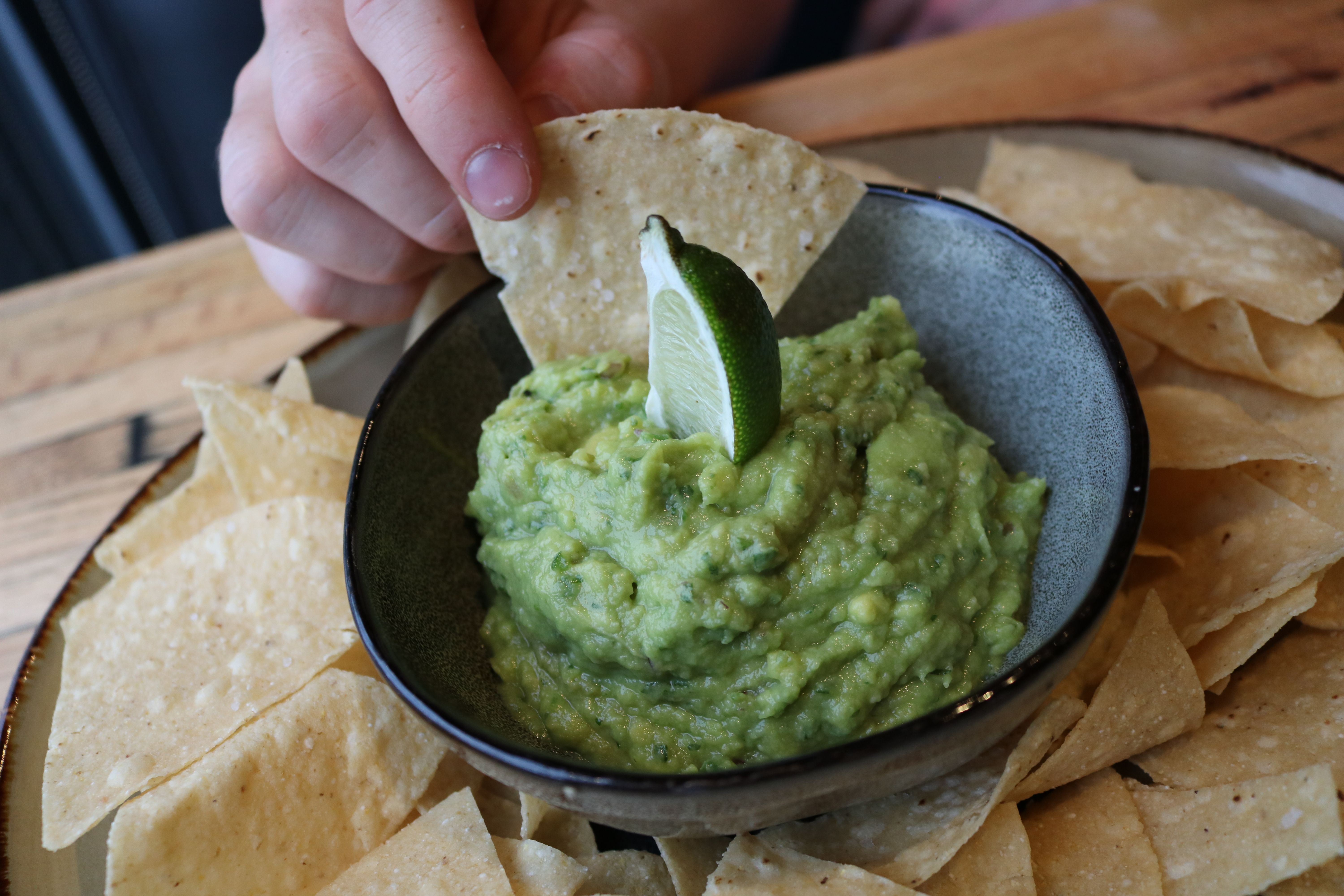 Order Chips + Guacamole food online from District 118 Kitchen And Bar store, Newton Upper Falls on bringmethat.com