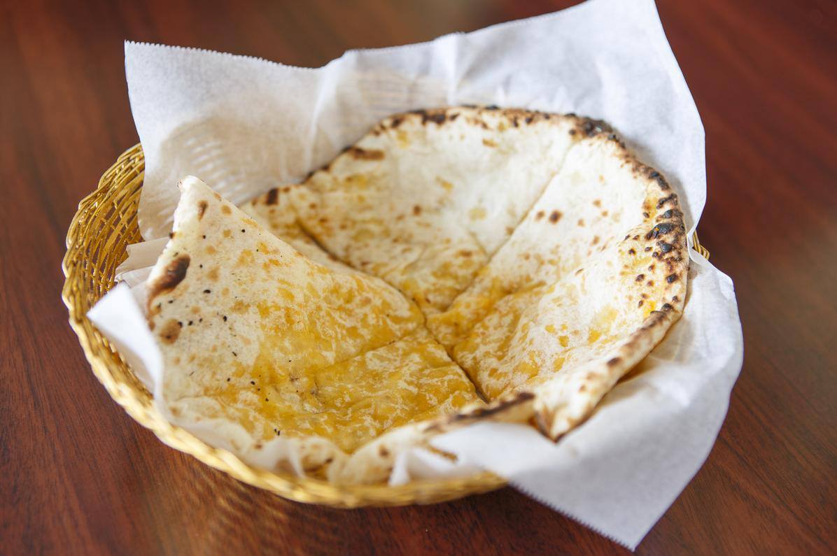 Order Cheese Naan food online from Indimex Eats Indian Restaurant store, Los Angeles on bringmethat.com