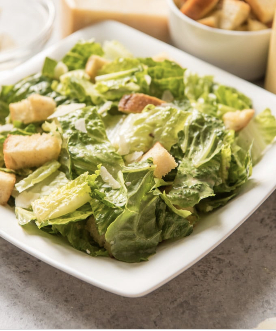 Order Caesar Salad food online from Milano Pizza store, Tracy on bringmethat.com