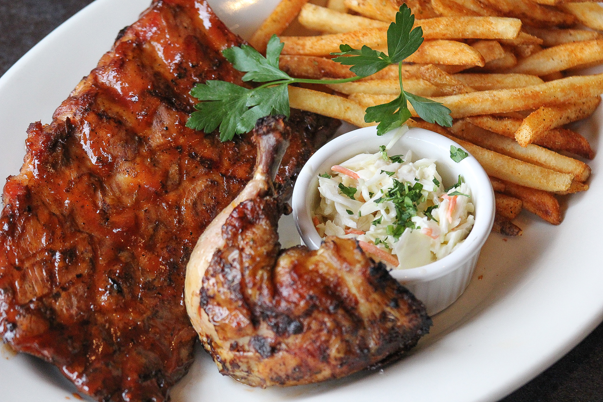Order Rib and Chicken Combo food online from Doolittles Woodfire Grill store, Eagan on bringmethat.com