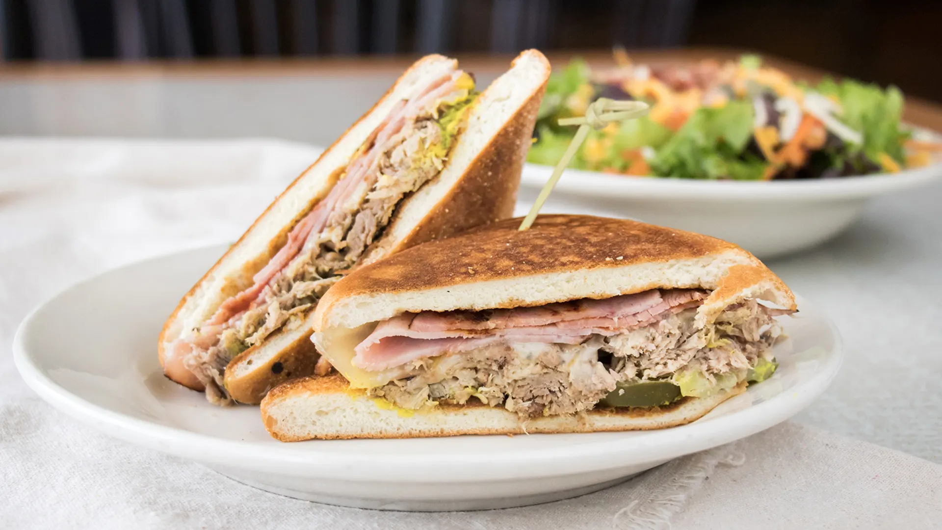 Order Pressed Cuban Sandwich food online from Lucky Dog Tavern and Grille store, Mason on bringmethat.com