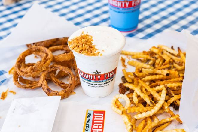 Order Shake of the Month food online from Mighty Fine Burgers Fries & Shakes store, Austin on bringmethat.com