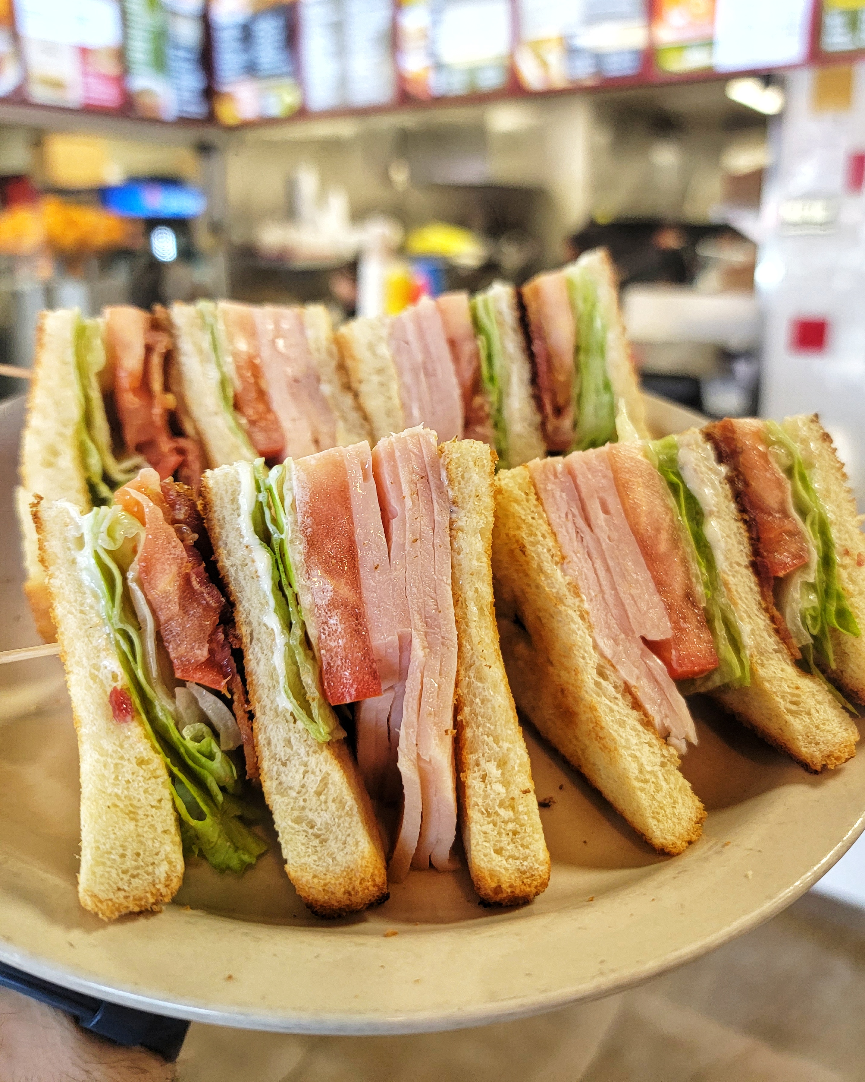 Order Club Sandwich  food online from Goody Cafe store, Palm Desert on bringmethat.com