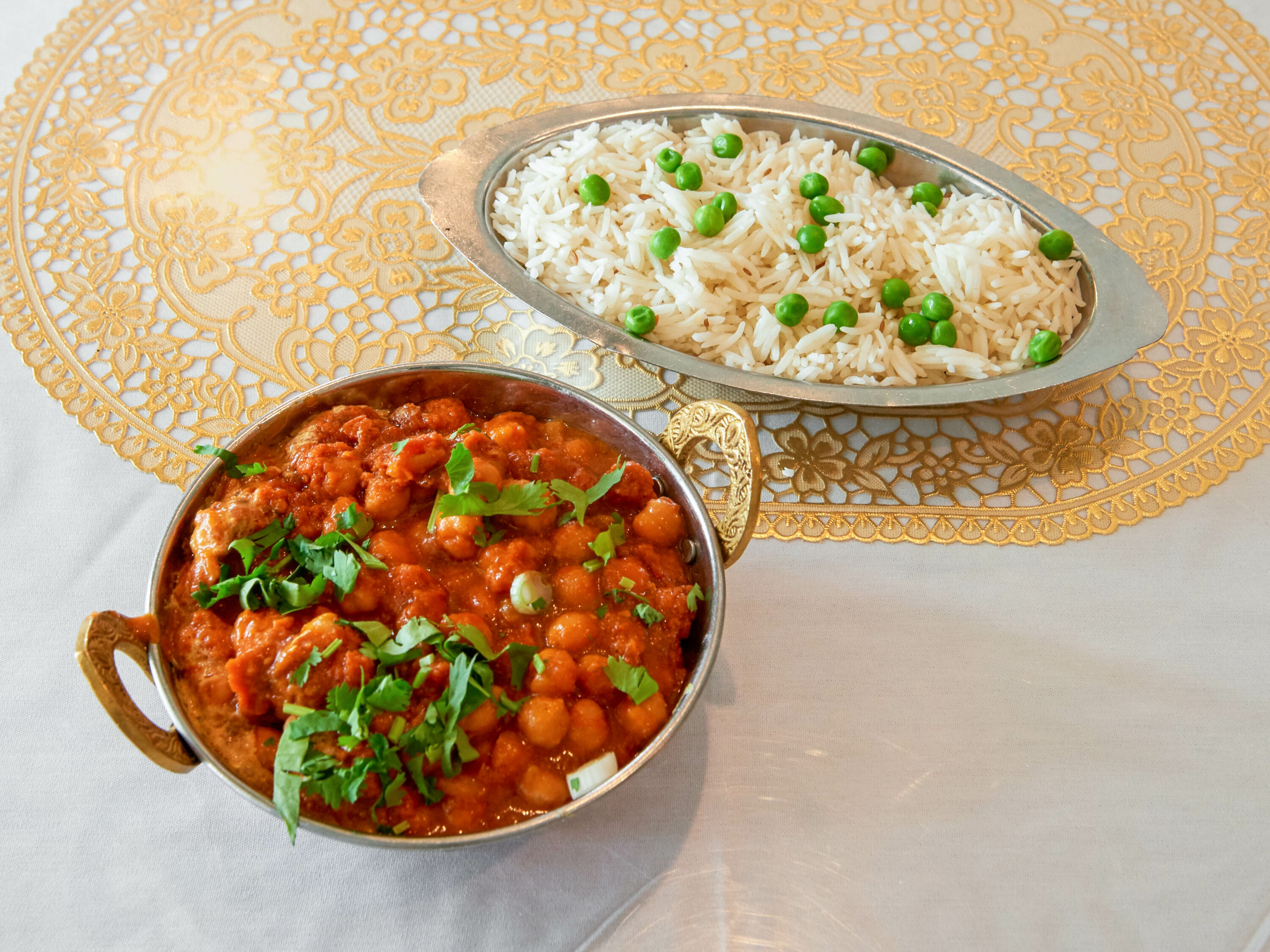 Order 77. Channa Masala food online from India Garden Restaurant store, Indianapolis on bringmethat.com