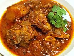 Order Goat Curry food online from Lazeez Indian-Mediterranean Grill store, Las Vegas on bringmethat.com