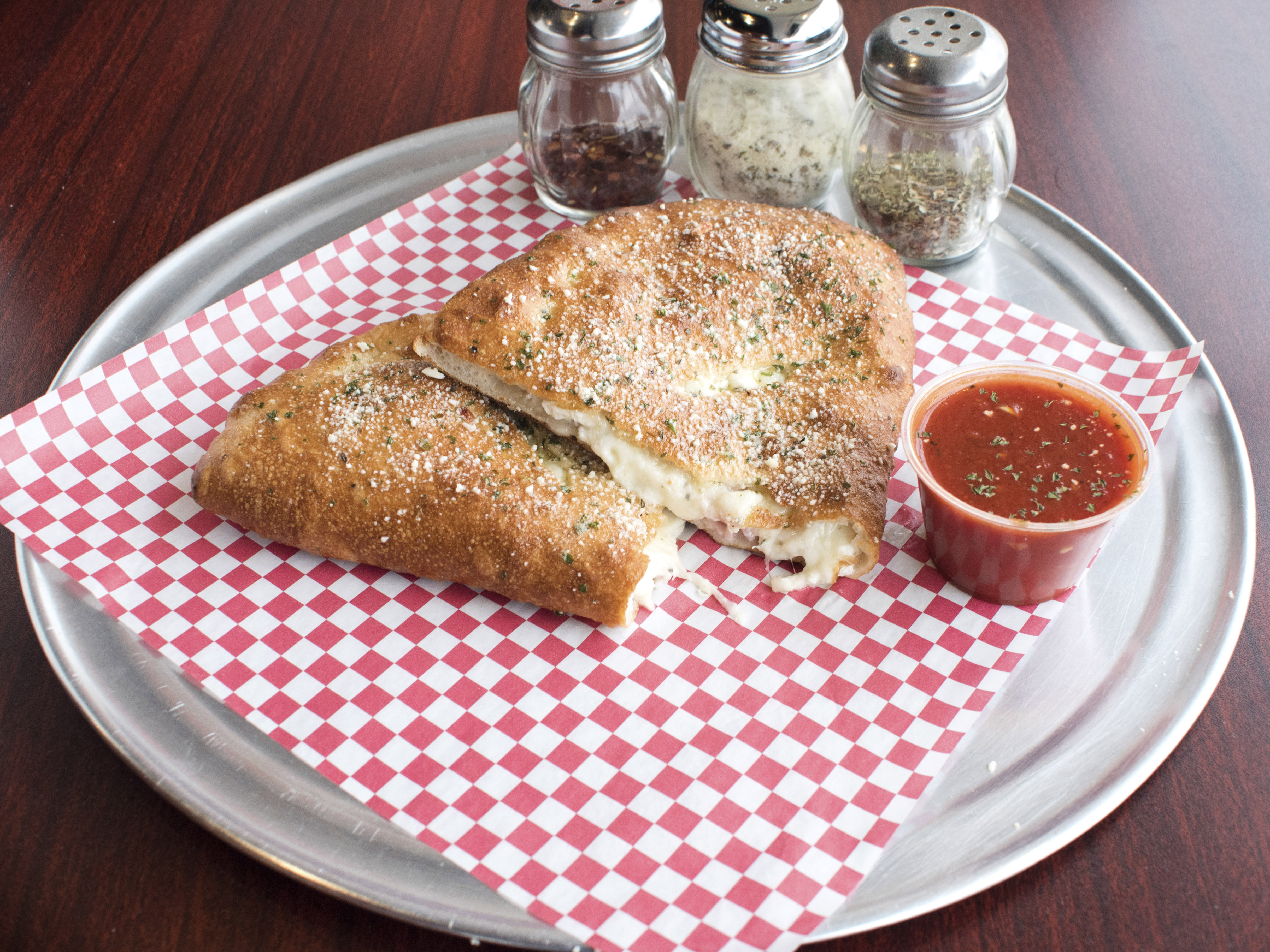 Order Cheese Calzone food online from Italian Village Pizza store, Dravosburg on bringmethat.com