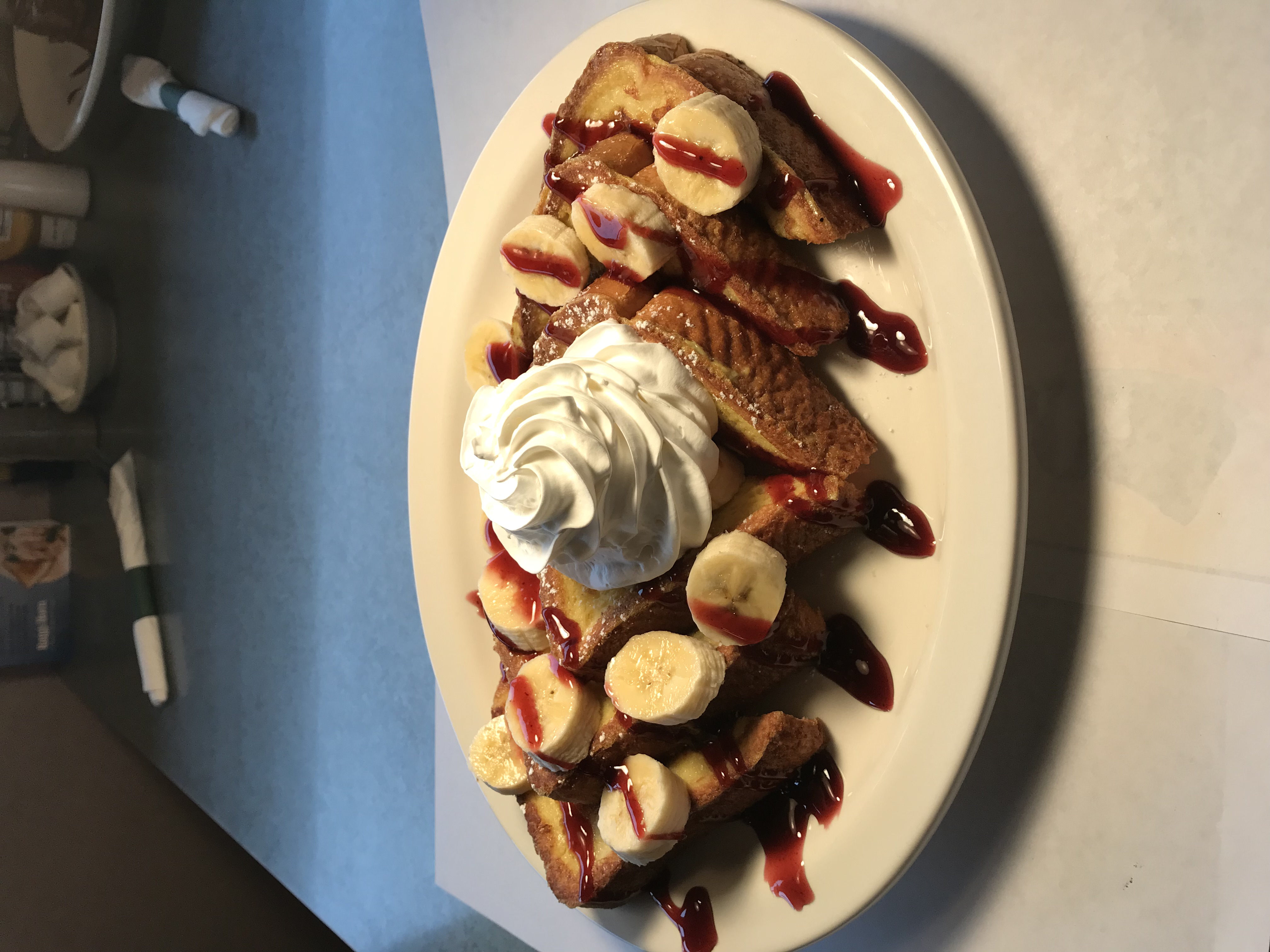 Order Raspberry Banana French Toast or Pancakes food online from Ram Horn Restaurant store, Taylor on bringmethat.com