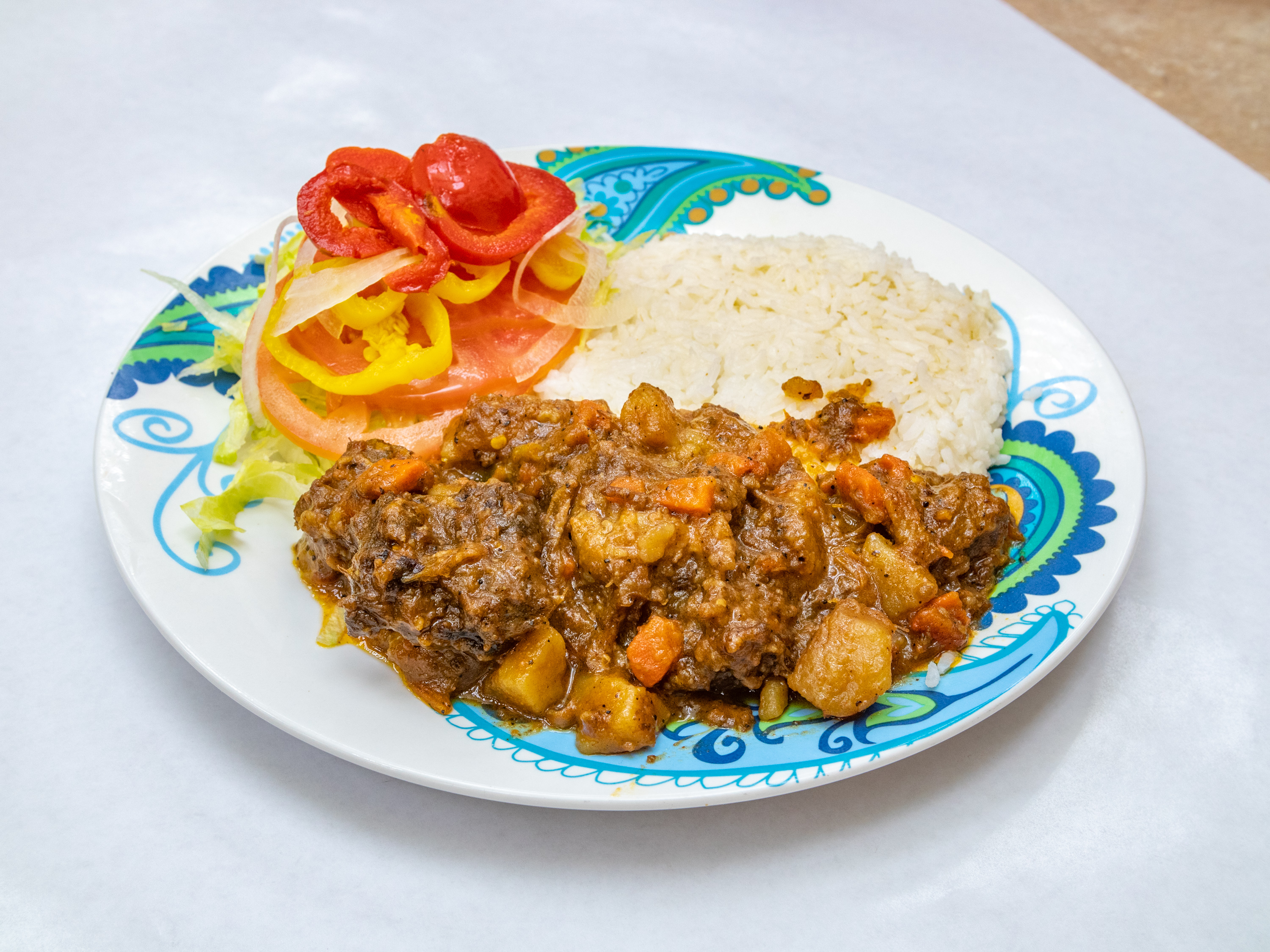 Order Oxtail with Rice and Salad Special food online from One Stop Snacks store, Neptune City on bringmethat.com