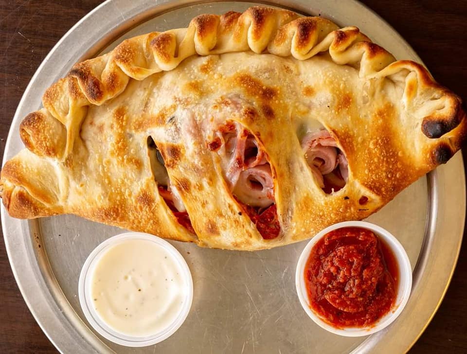 Order Calzone food online from Curbin Cuisine store, Des Moines on bringmethat.com