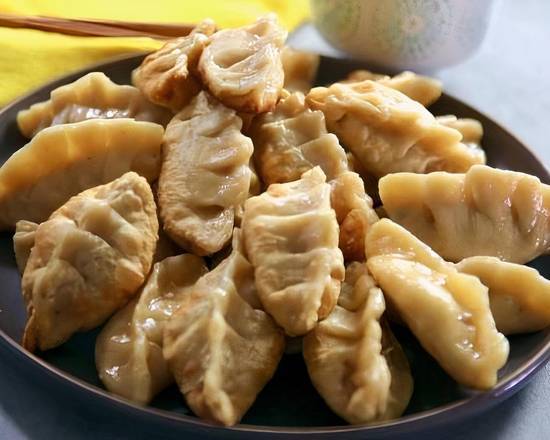 Order Chicken Potstickers (เกี้ยวซ่า) food online from Basil Cart store, San Francisco on bringmethat.com