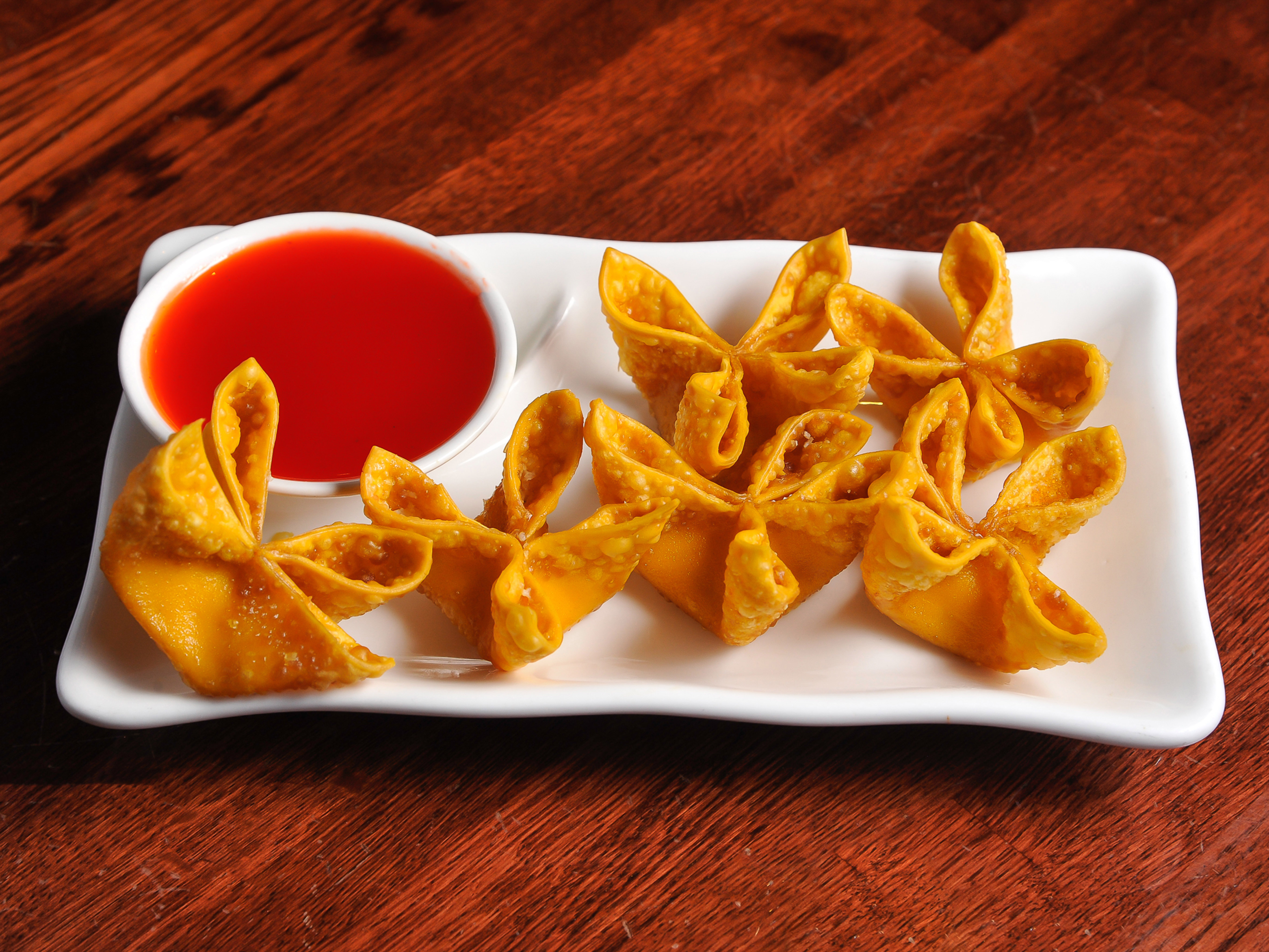 Order 6 Piece Crab Rangoon food online from Spice 3:16 store, Cumming on bringmethat.com