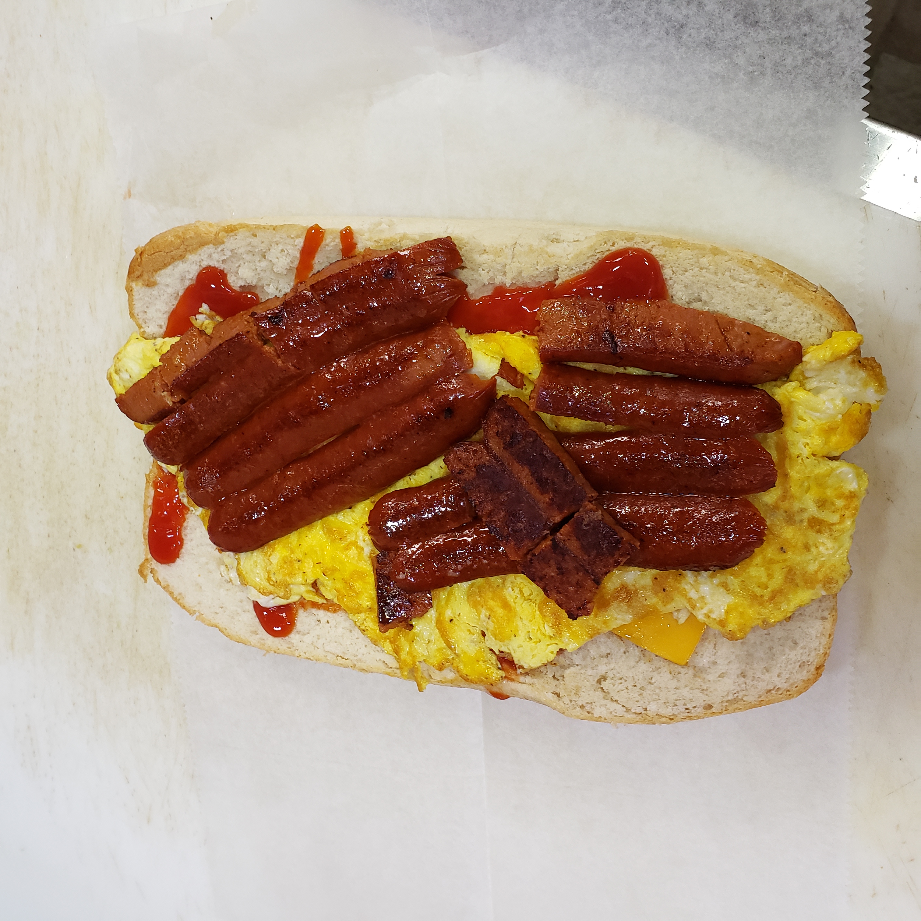Order Egg Hero with Beef Sausage food online from S. Gardens Deli store, Springfield Gardens on bringmethat.com