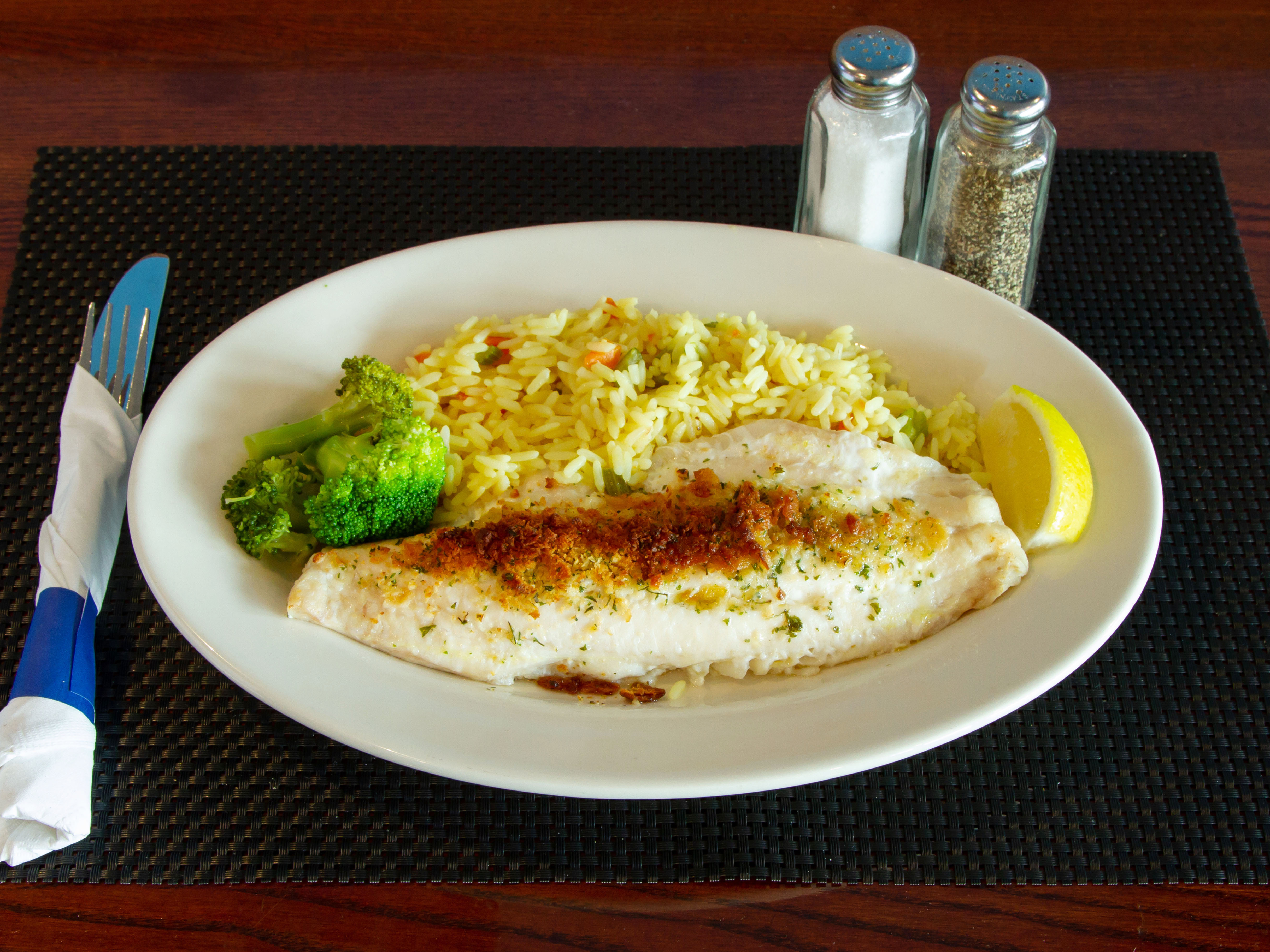 Order Baked Haddock Dinner food online from Zorba Pizza & Pub store, North Providence on bringmethat.com