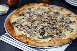 Order 10" Funghi THIN food online from Patxi's Pizza store, San Francisco on bringmethat.com