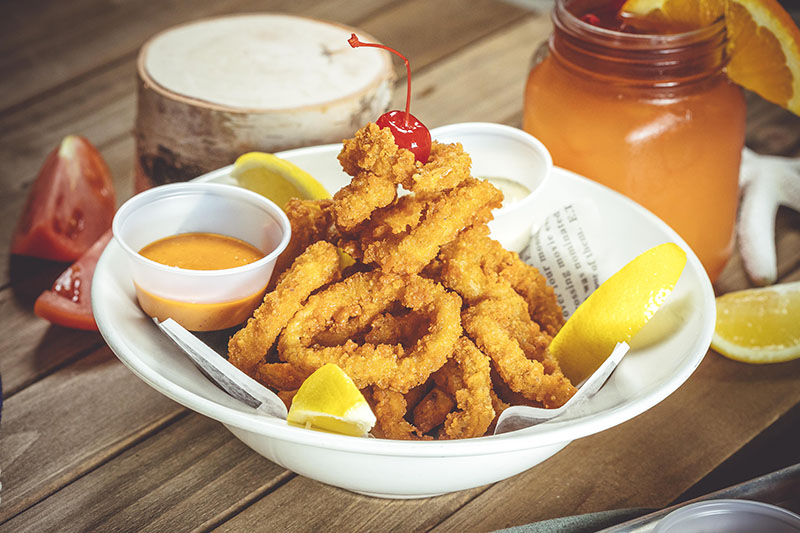 Order Fried Calamari with Cajun Fries food online from Holy Crab Cajun store, White Plains on bringmethat.com