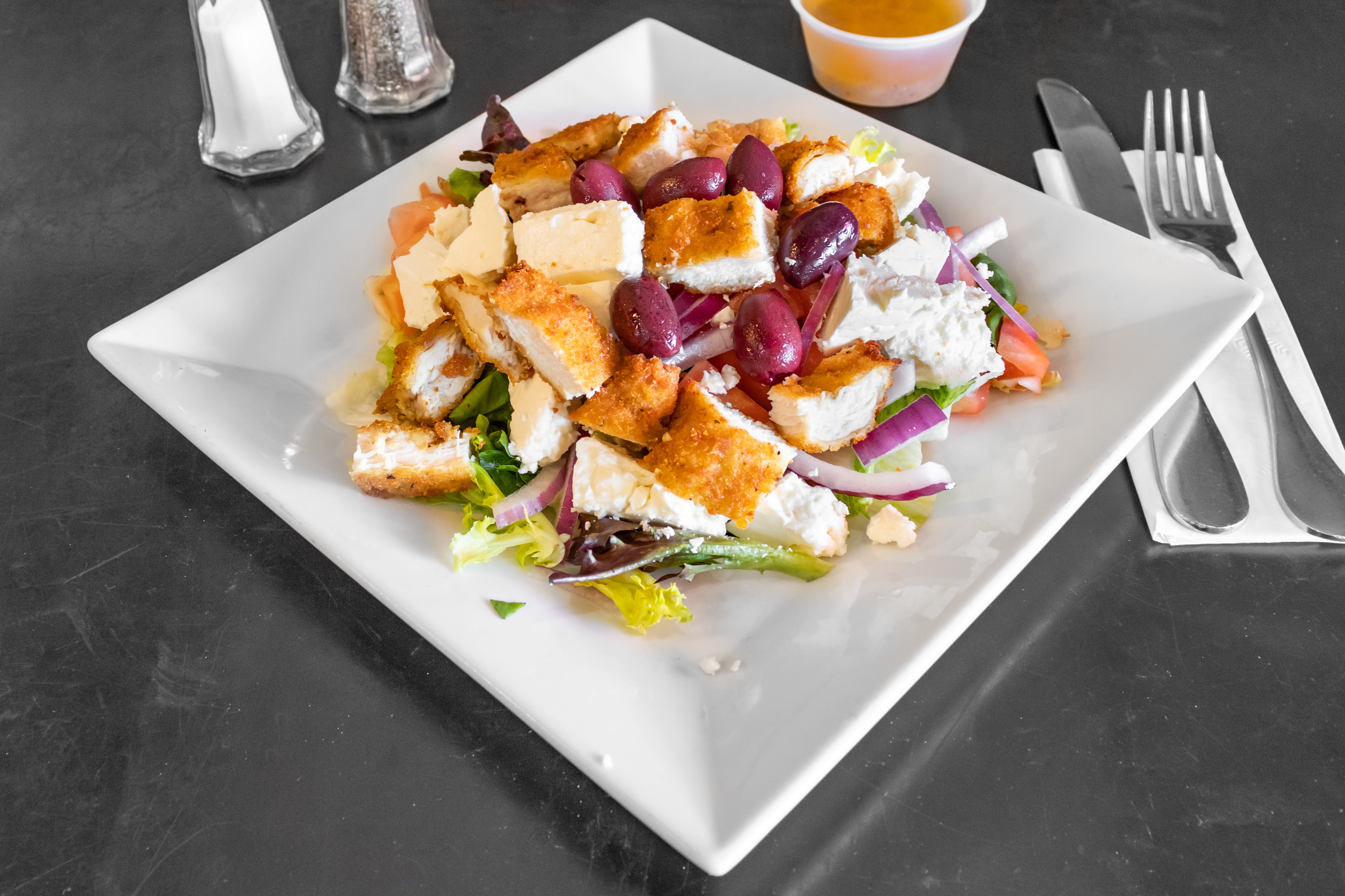 Order Greek Salad - Small food online from Europa Pizza store, Carmel on bringmethat.com