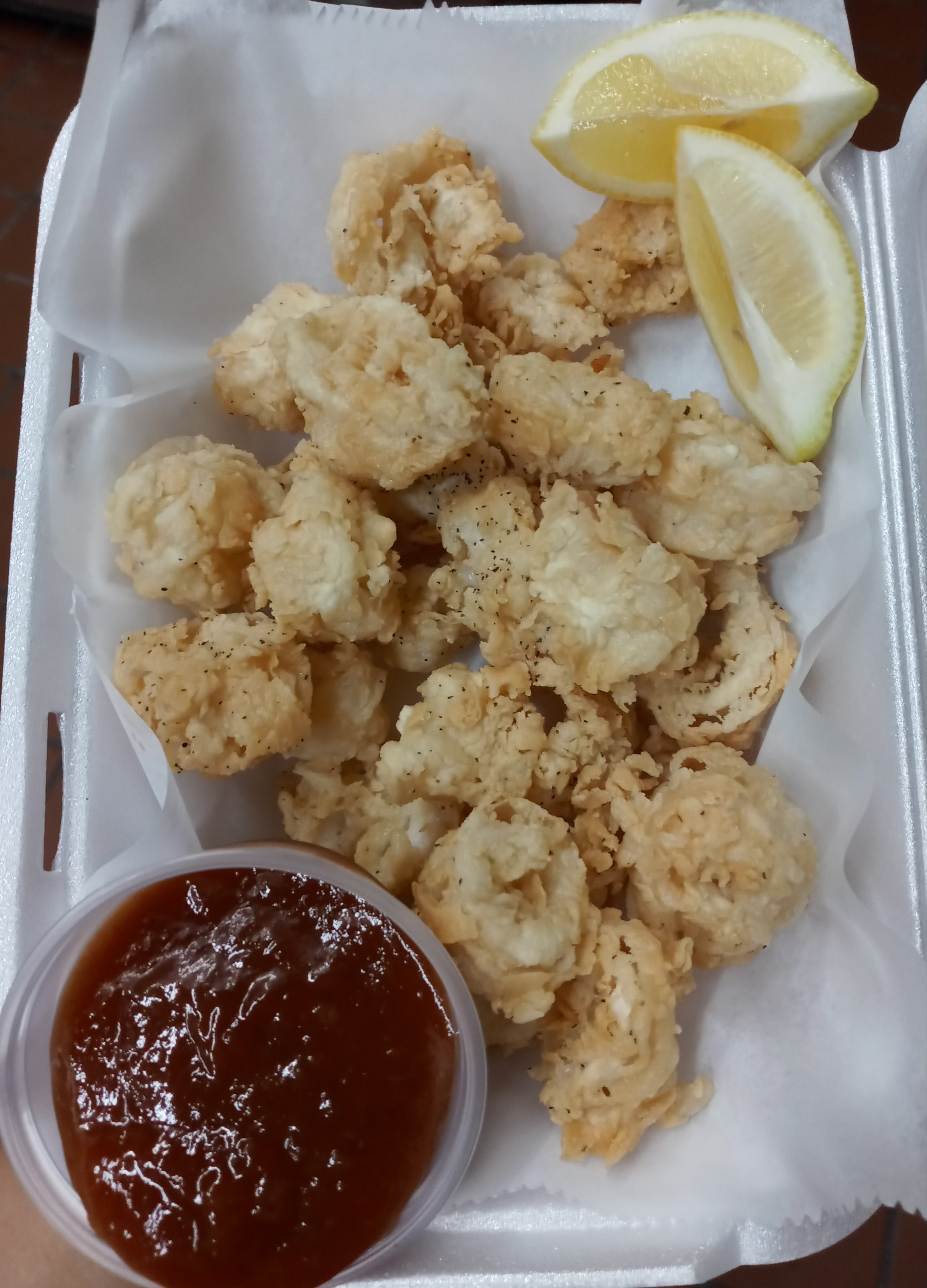 Order Fried Calamari food online from Village Pizza store, Chicago on bringmethat.com