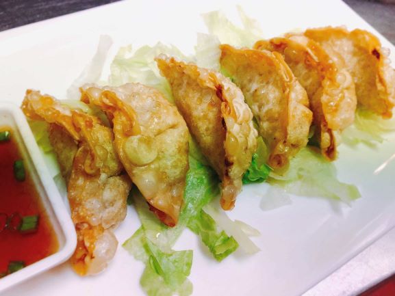 Order Pork Gyoza food online from Tintin Cafe store, Charlotte on bringmethat.com
