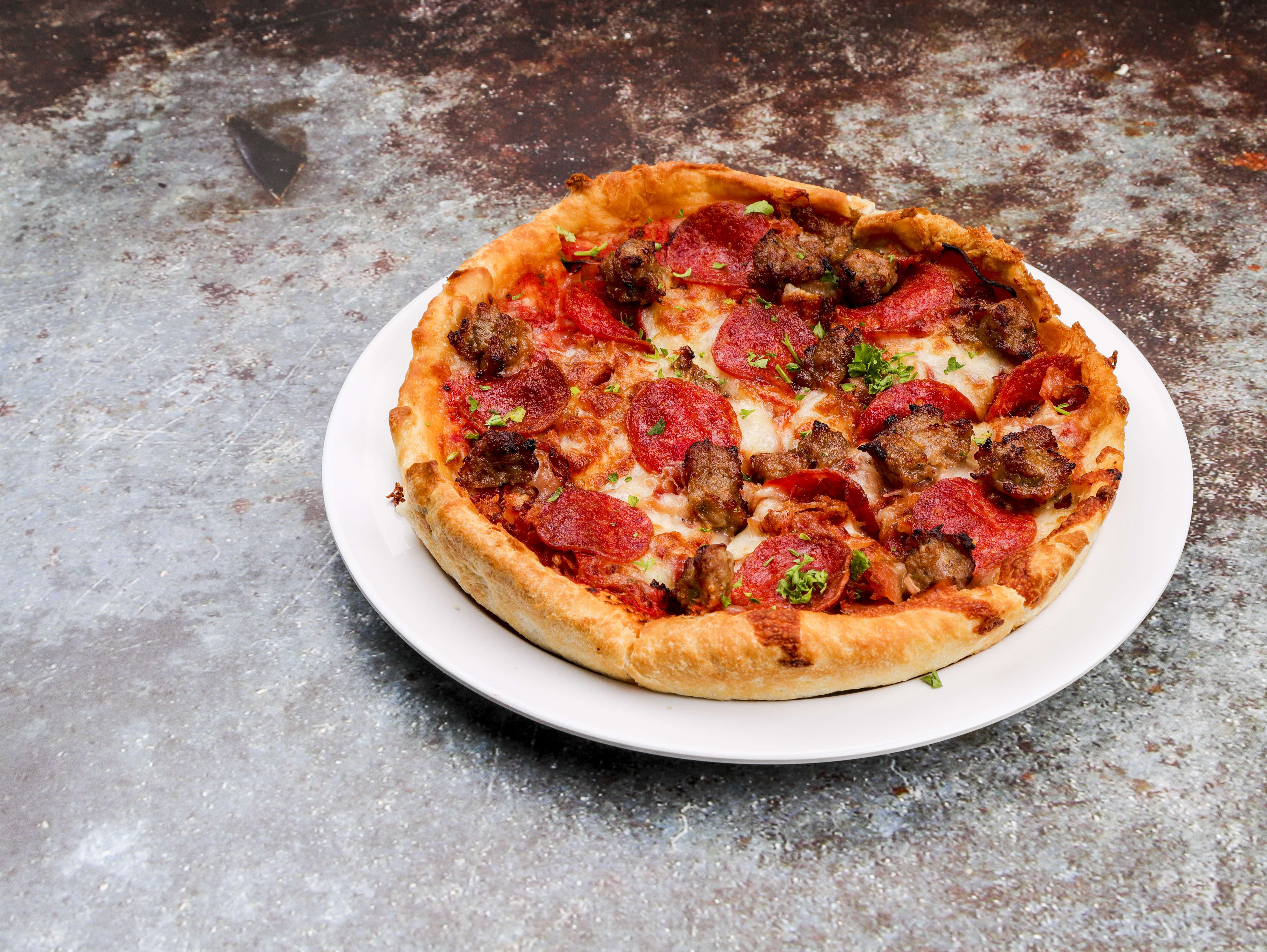 Order Meat Lovers Pizza food online from Italian Garden store, Akron on bringmethat.com