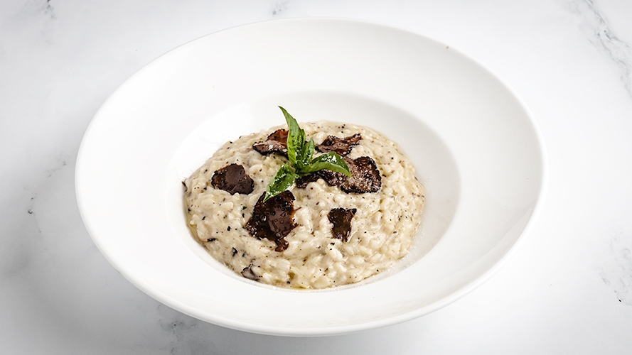 Order Risotto Prosecco & Black Truffle food online from Serafina store, New York on bringmethat.com