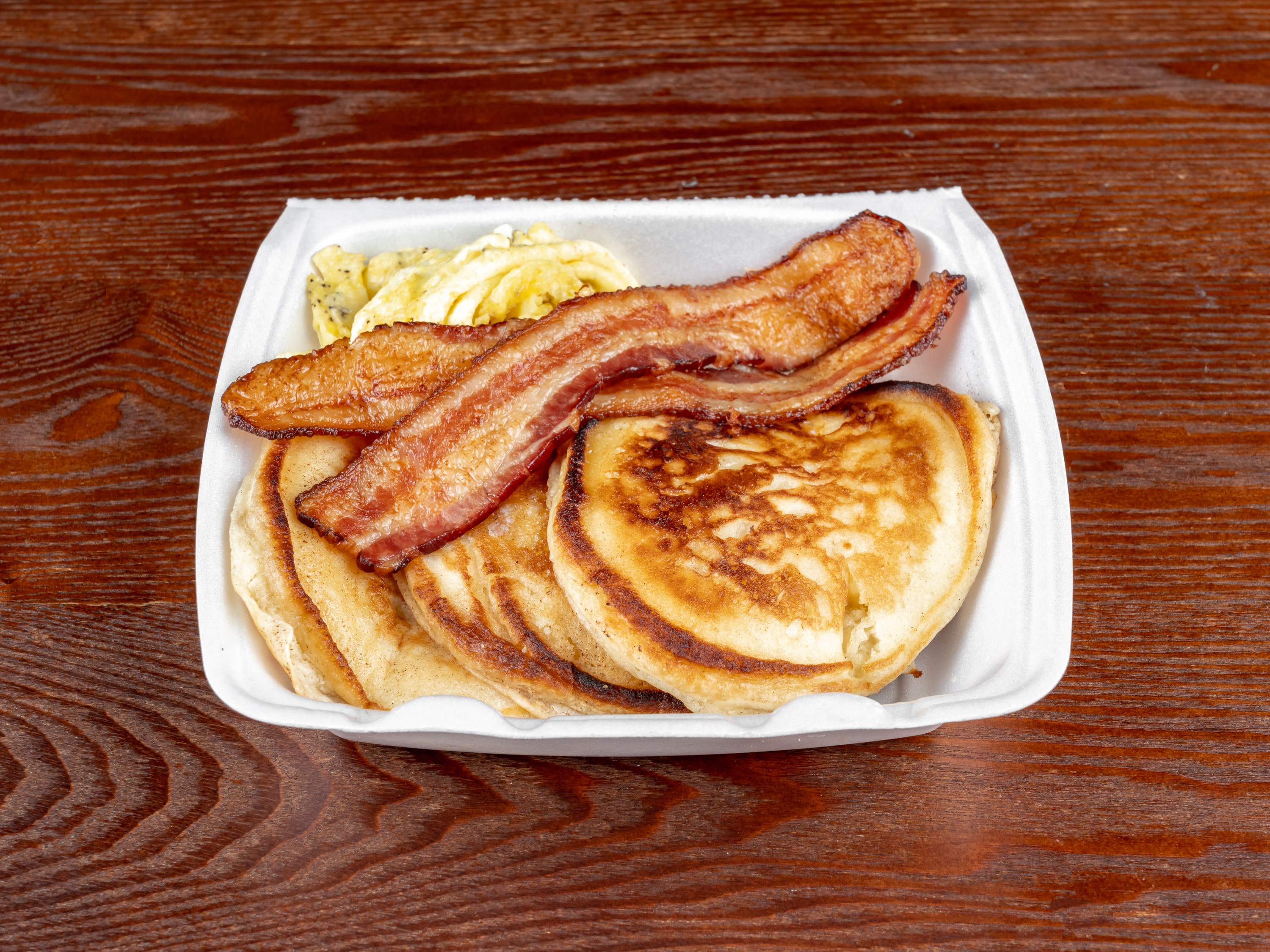 Order 3 Buttermilk Pancakes, 2 Eggs and 2  Bacon food online from Meraki Kitchen store, Houston on bringmethat.com