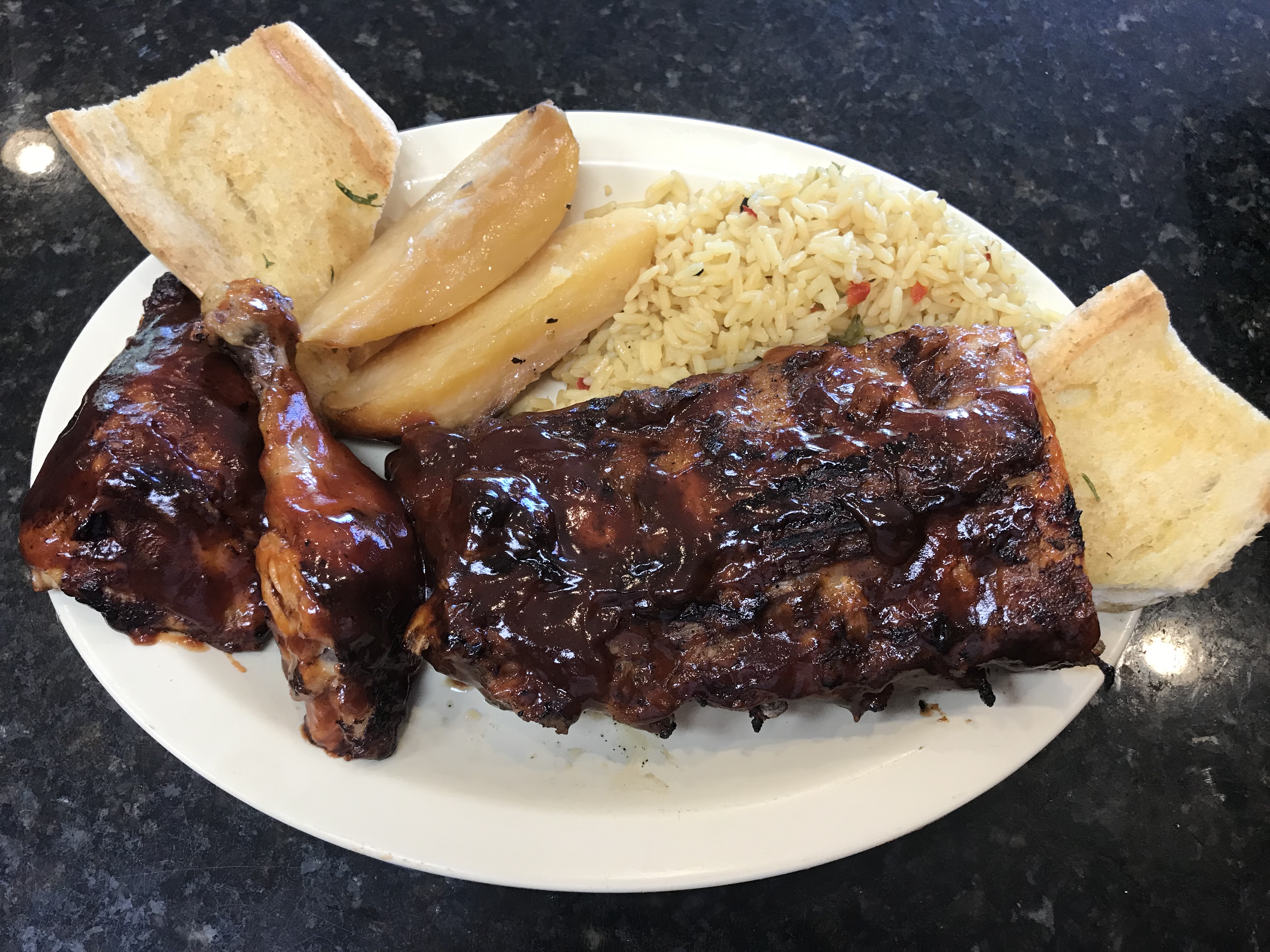 Order 1/2 Slab Ribs and 1/4 Chicken BBQ Combo food online from Mr. gee's store, Chicago on bringmethat.com