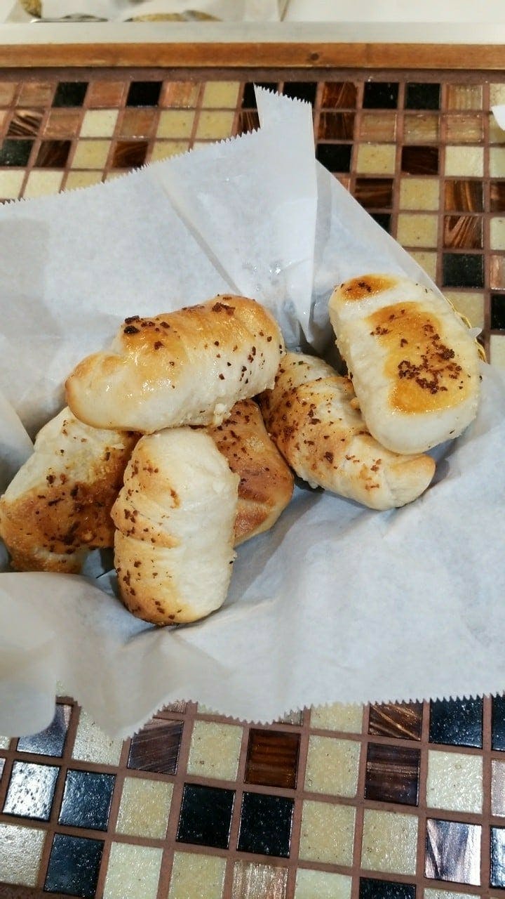 Order Garlic Knots - 6  Pieces food online from La Cucina Della Nonna store, Jamestown on bringmethat.com
