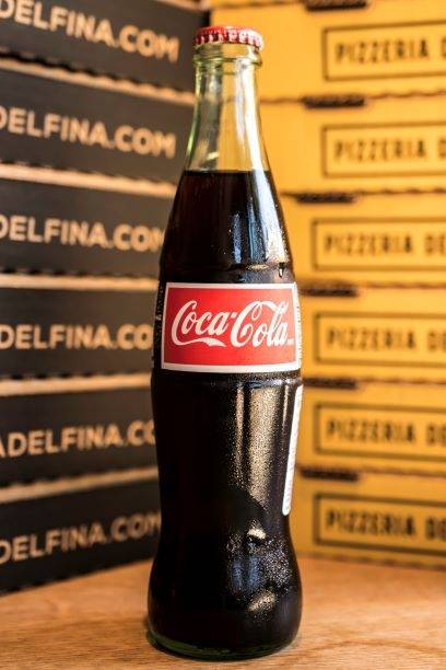 Order Mexican Coke food online from Pizzeria Delfina store, Burlingame on bringmethat.com