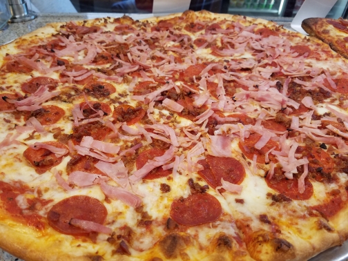 Order Meat Lover's Pizza food online from Slice of NY Pizza store, Raleigh on bringmethat.com