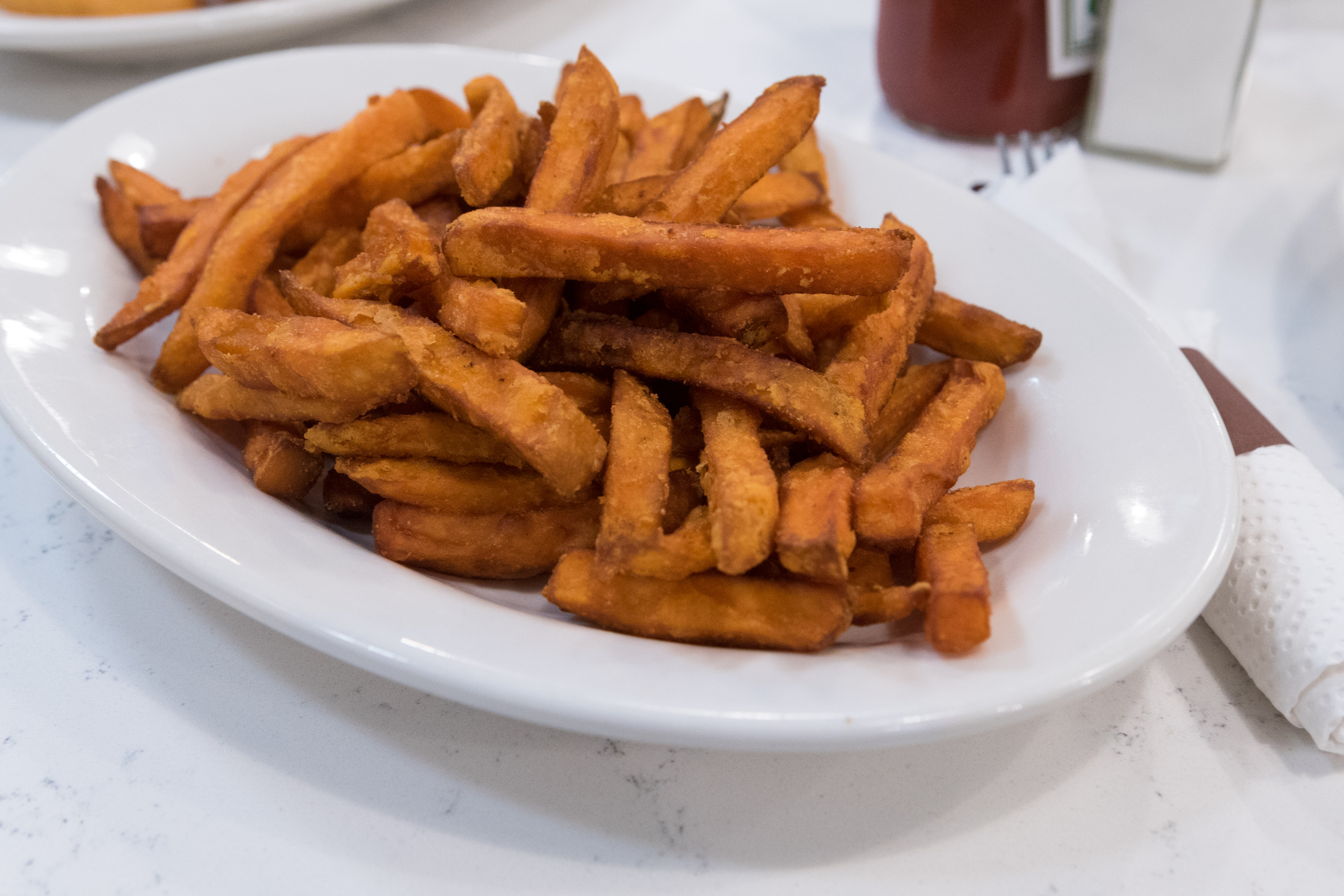 Order Sweet Potato Fries food online from Tasty's restaurant store, Ridgewood on bringmethat.com