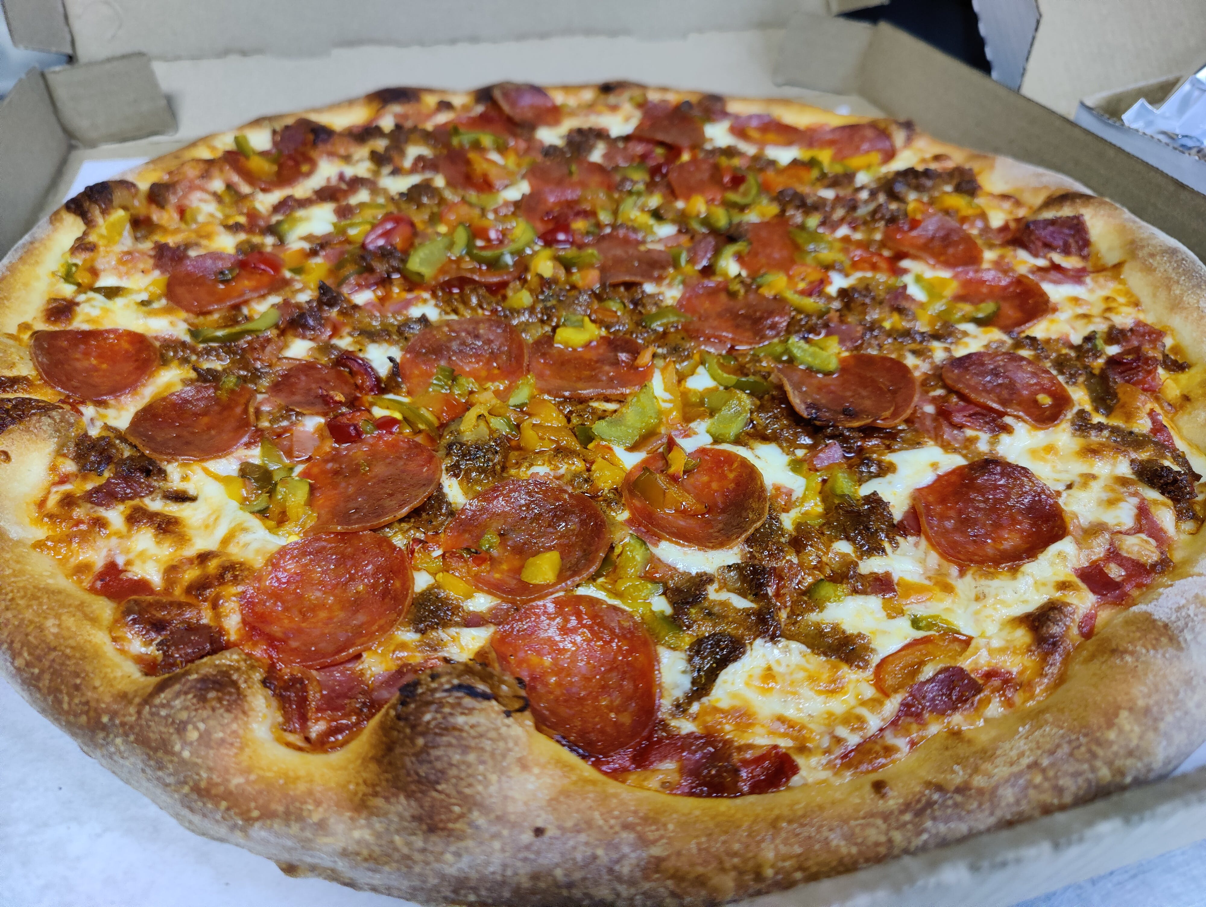 Order Wise Guy Pizza - Medium 14" food online from Lucino Pizza store, Las Vegas on bringmethat.com