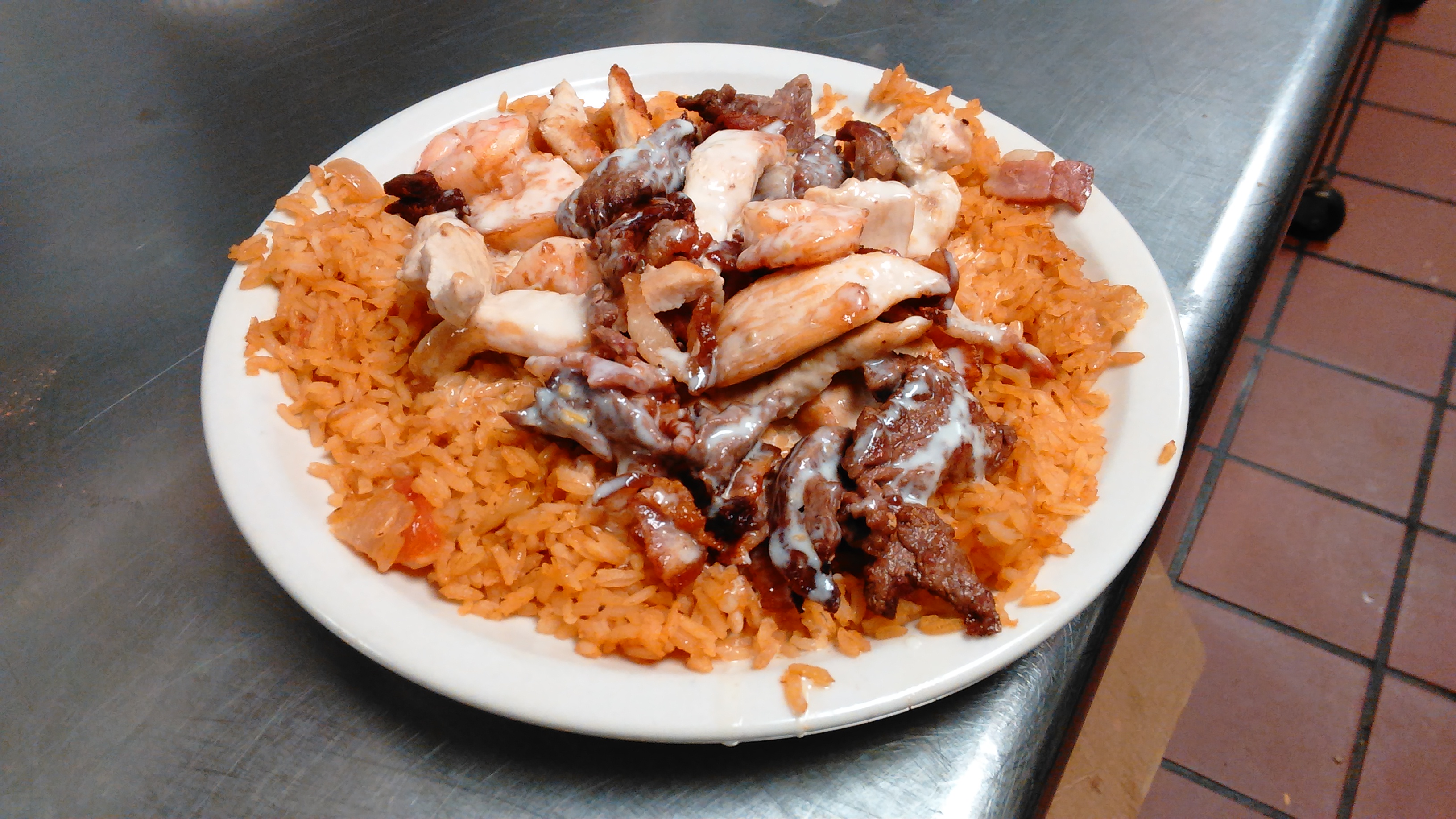 Order El Toriado food online from La Fiesta Charra store, Sioux City on bringmethat.com