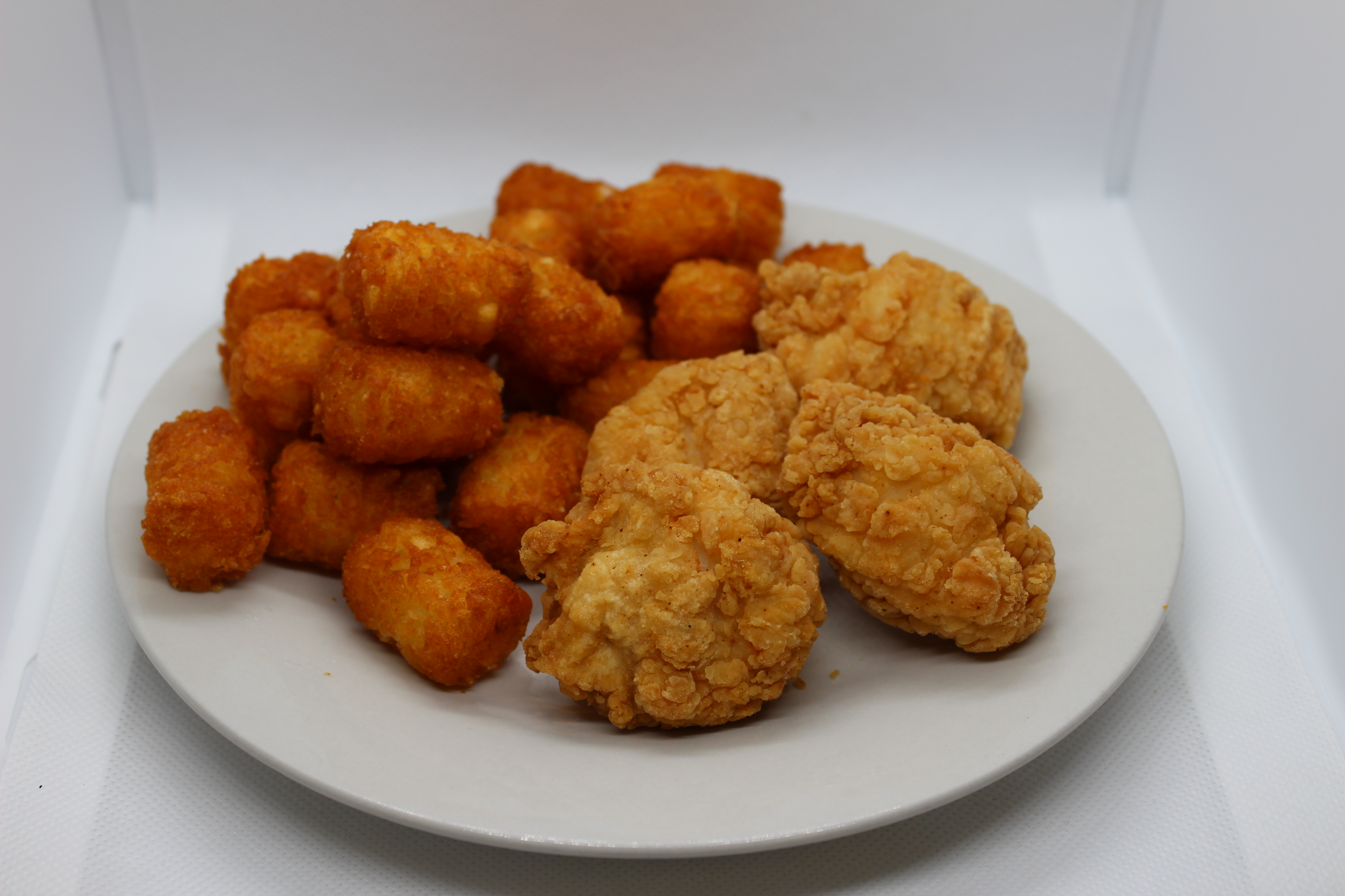 Order Kid's 4 Chicken Nuggets with Tater Tots food online from Two Mamas' Gourmet Pizzeria store, Prescott on bringmethat.com