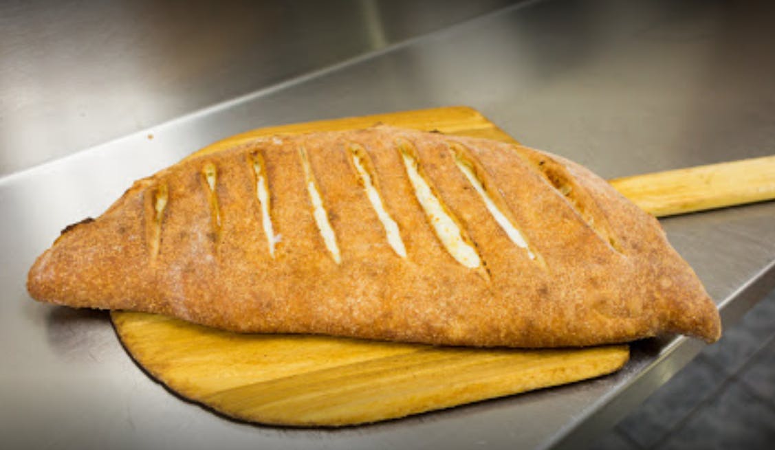 Order Calzone - Calzone food online from Mick's Pizza store, Cohoes on bringmethat.com