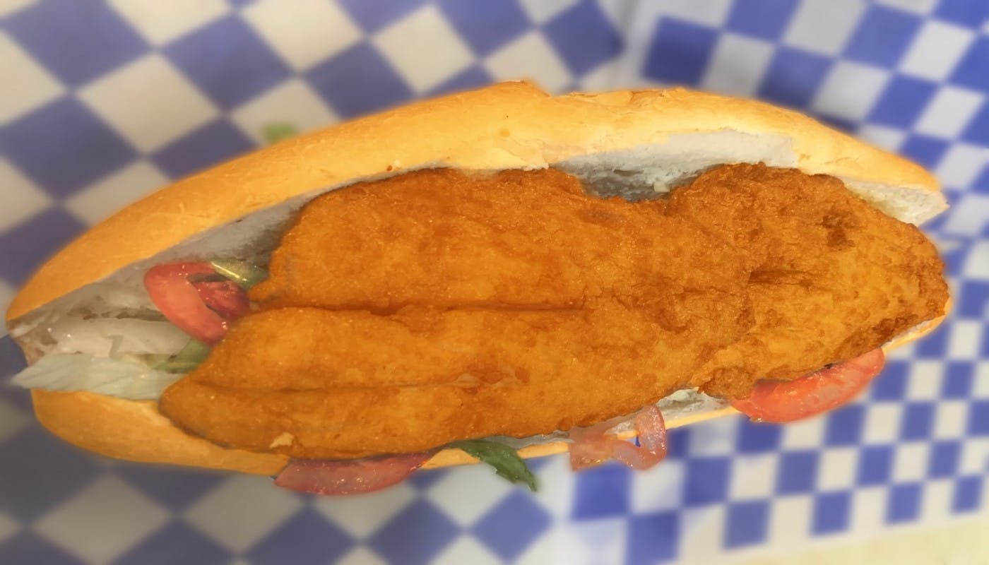 Order Fish Po Boy Sub - Small 8" food online from Village Pizza & Seafood store, Texas City on bringmethat.com