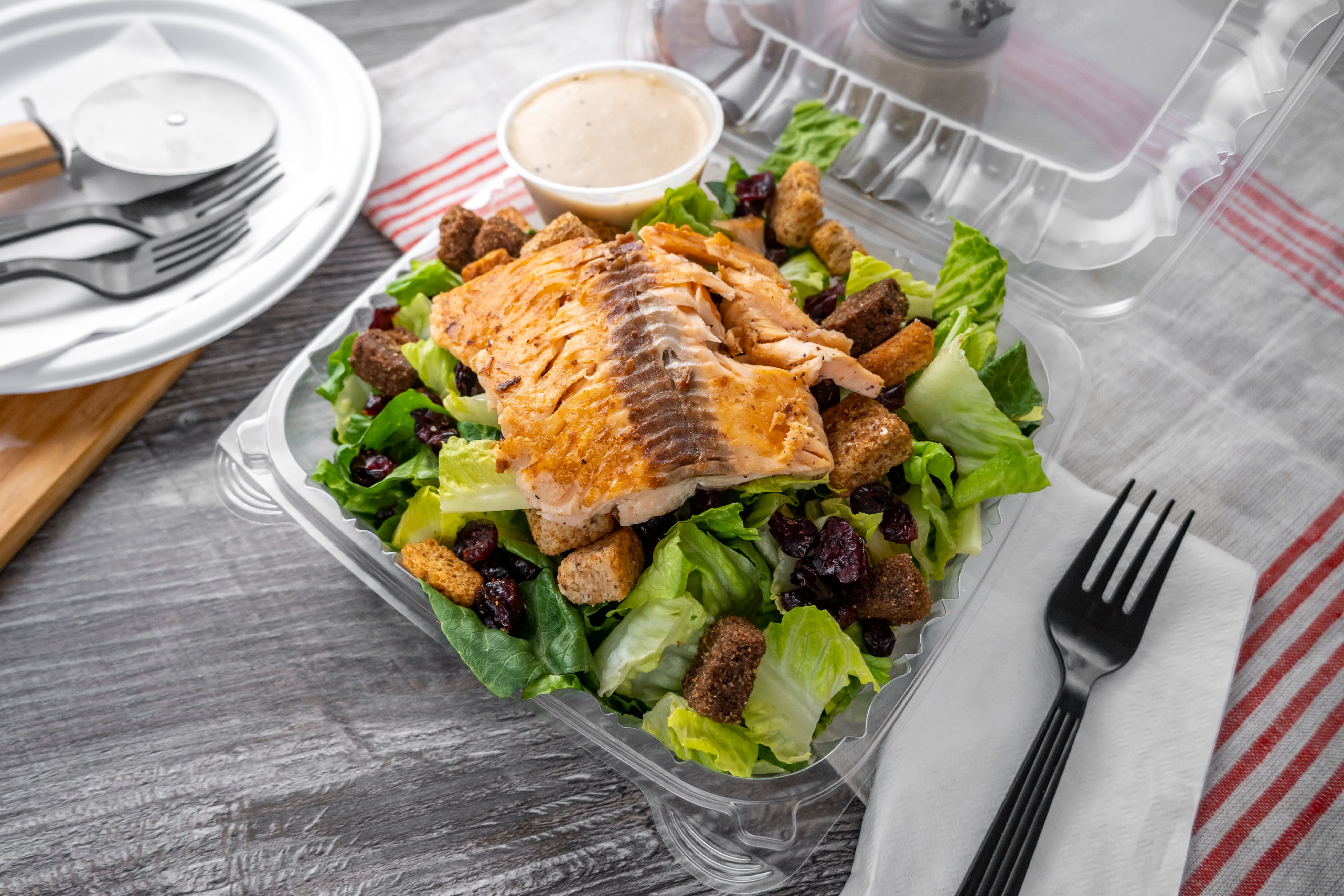 Order Wild Salmon Caesar Salad - Salad food online from Firepit Pizzeria & Grill store, Springfield on bringmethat.com