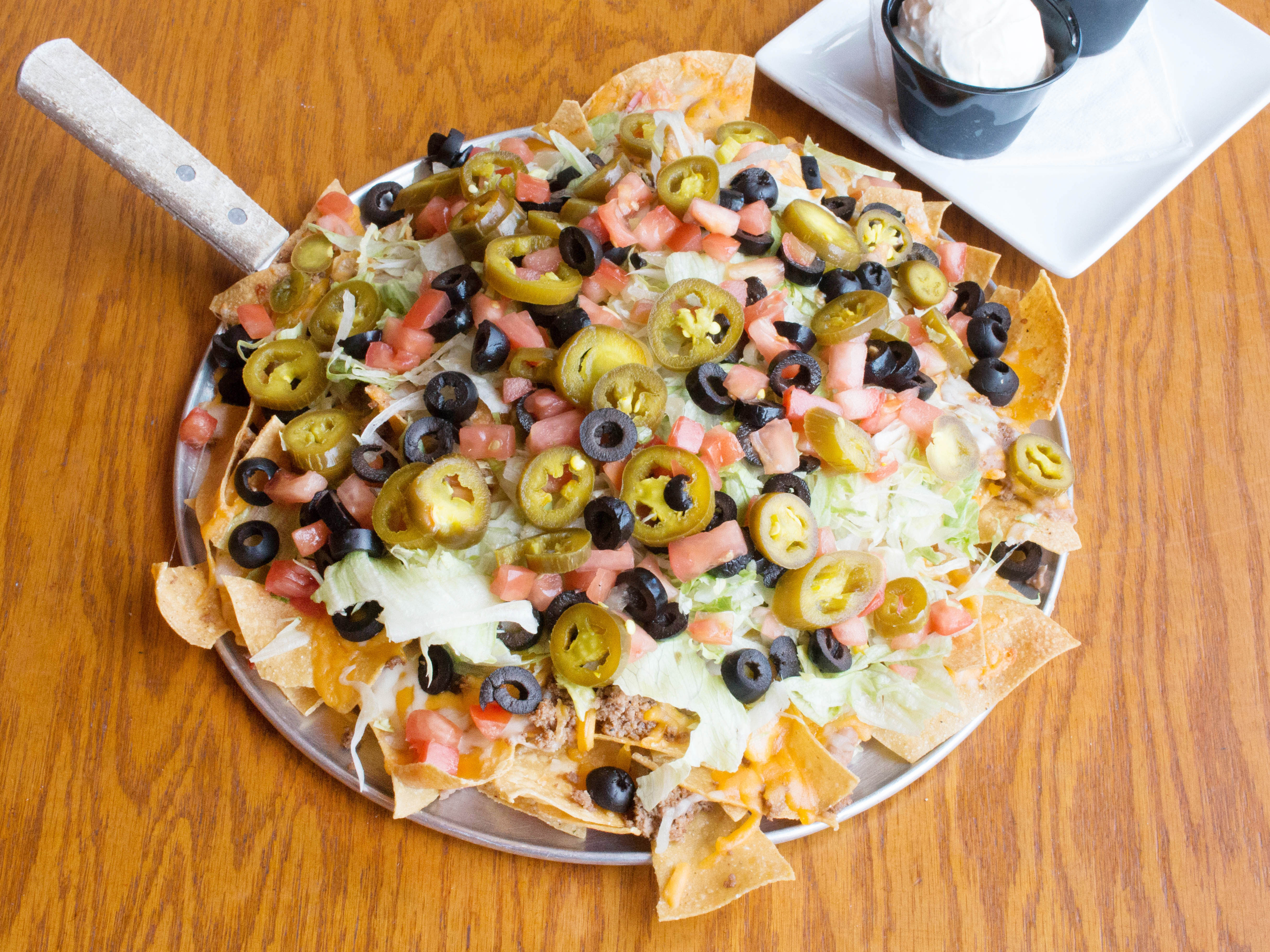 Order Pub Nachos food online from Cj Brewing Company store, Commerce Township on bringmethat.com