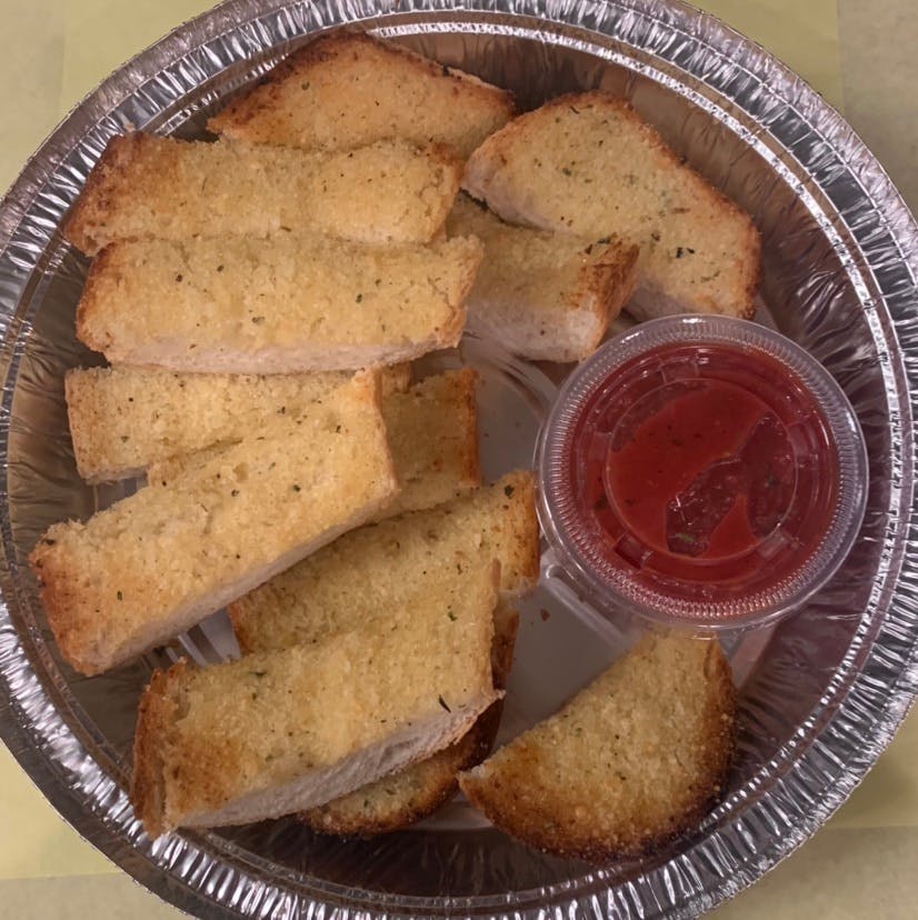 Order 1. Garlic Bread - Appetizer food online from Village Cafe & Pizza store, Los Angeles on bringmethat.com