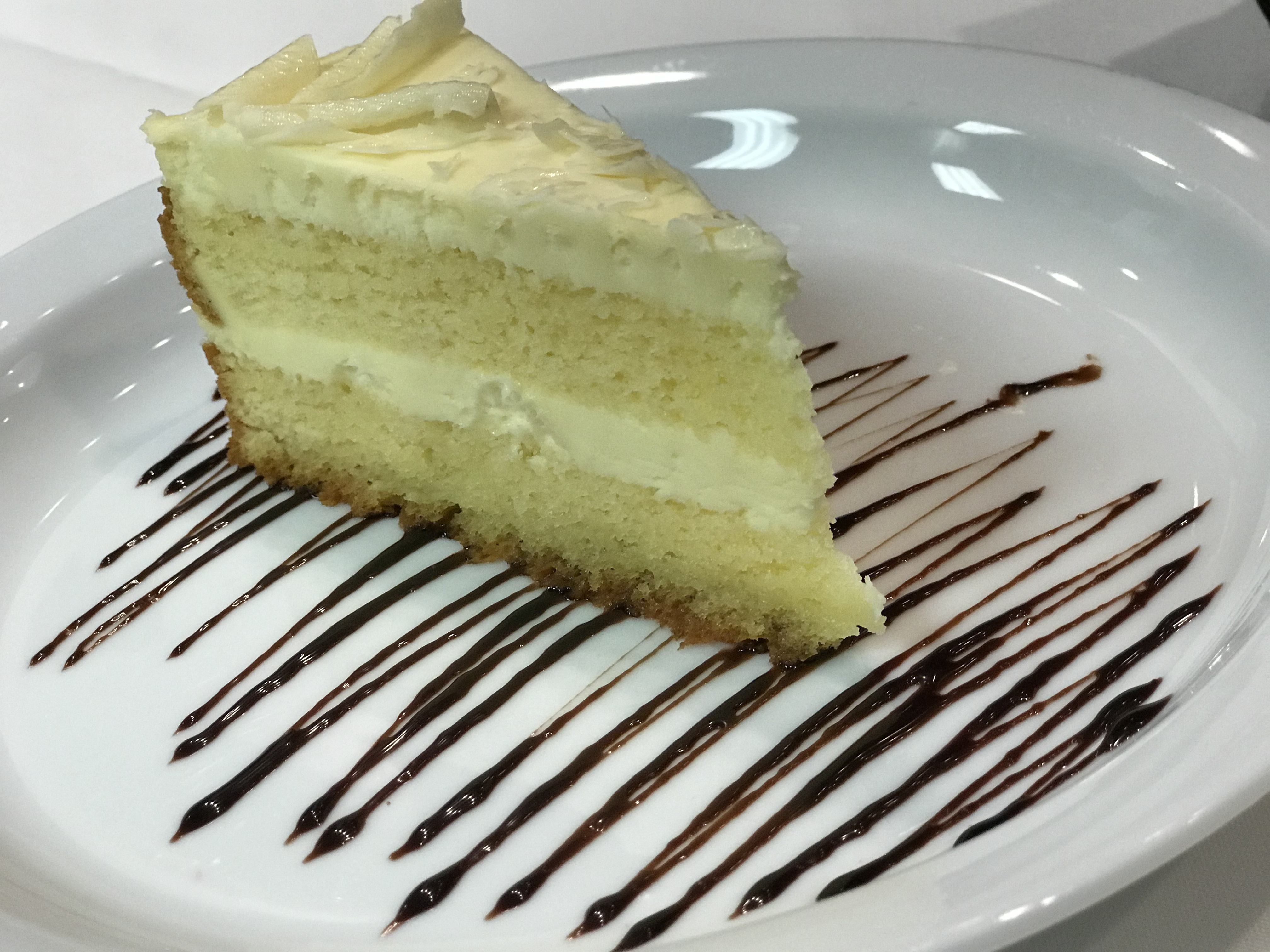 Order Lemon Mousse Cake food online from Bruno Italian Kitchen store, Beaumont on bringmethat.com
