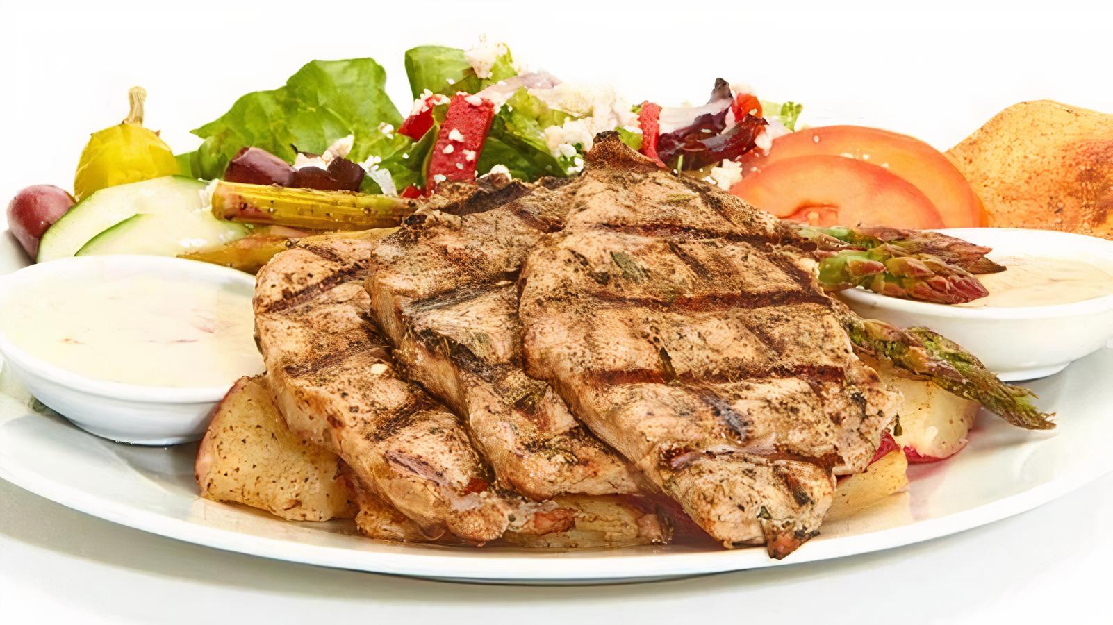 Order Herb Roasted Pork Loin Feast food online from Taziki Cafe store, Tuscaloosa on bringmethat.com