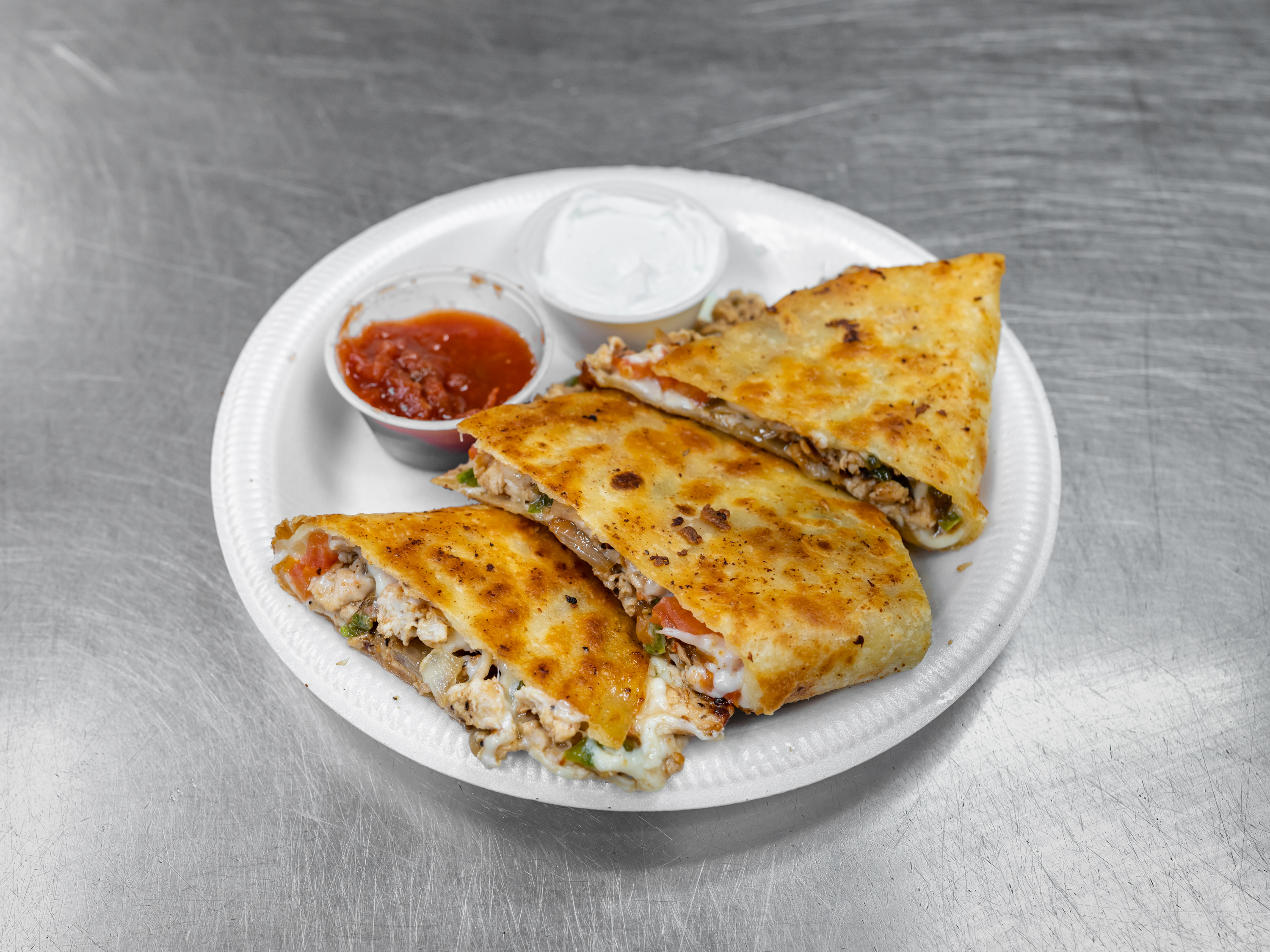 Order Quesadilla  CHICKEN OR STEAK food online from Hopkins Store store, Richmond on bringmethat.com