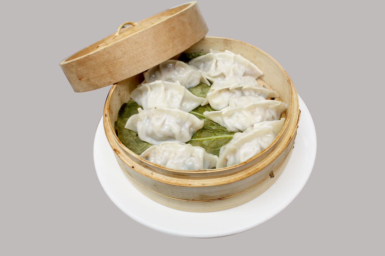 Order A2. Steamed Dumplings food online from Hyo dong gak store, New York on bringmethat.com